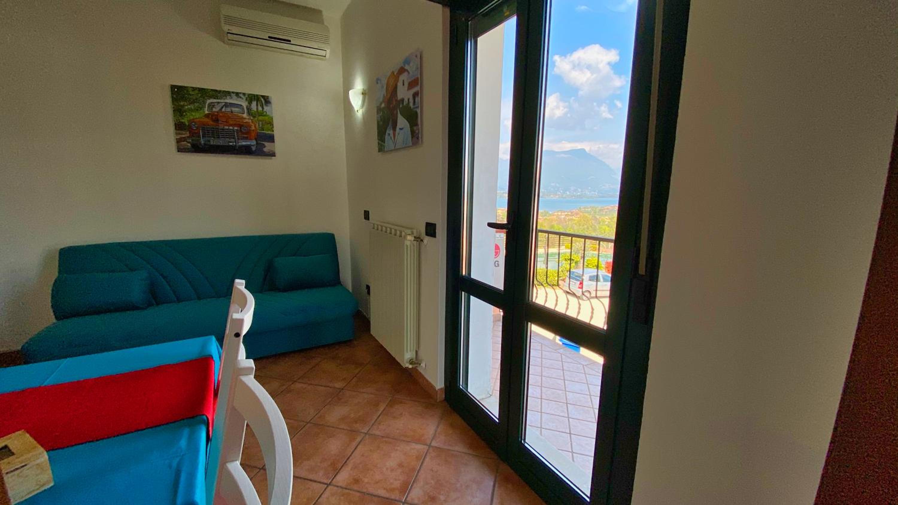 Apartment with Balcony and Lake View - Street Side photo 3