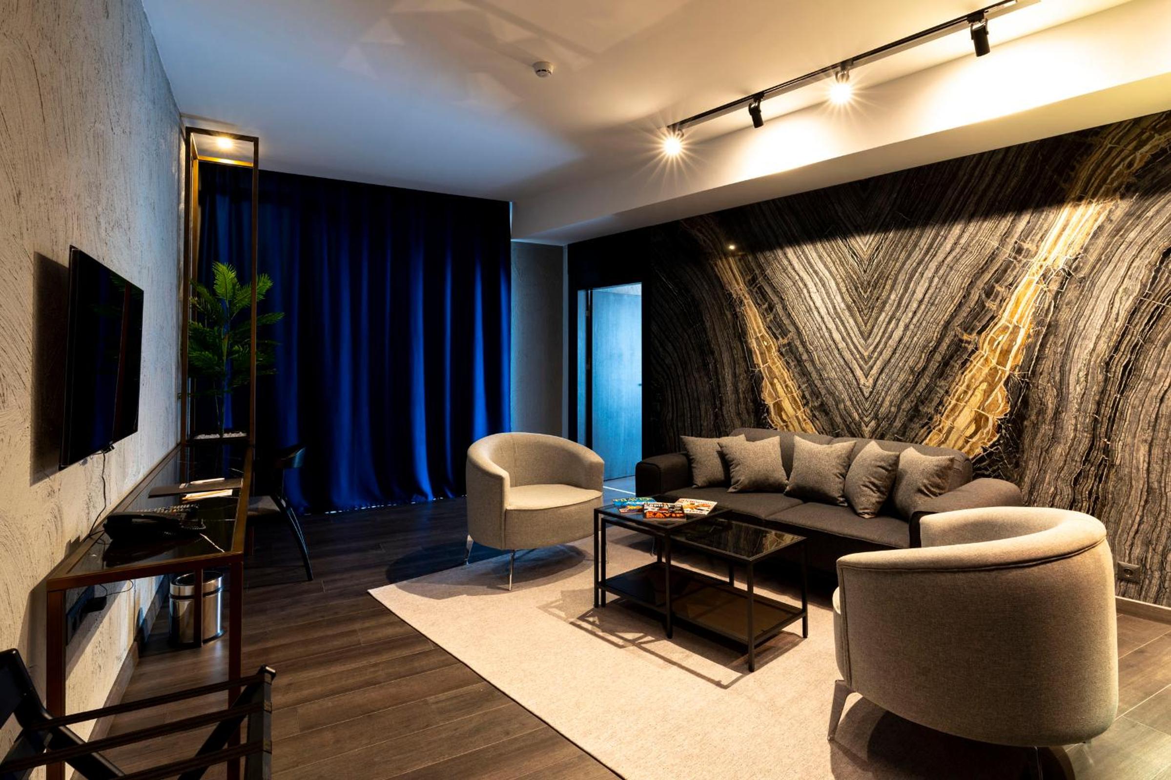 King Suite with Balcony - Photo 1