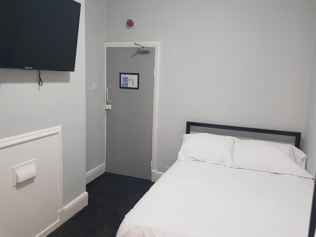 Small Double Room with Shared Shower Room