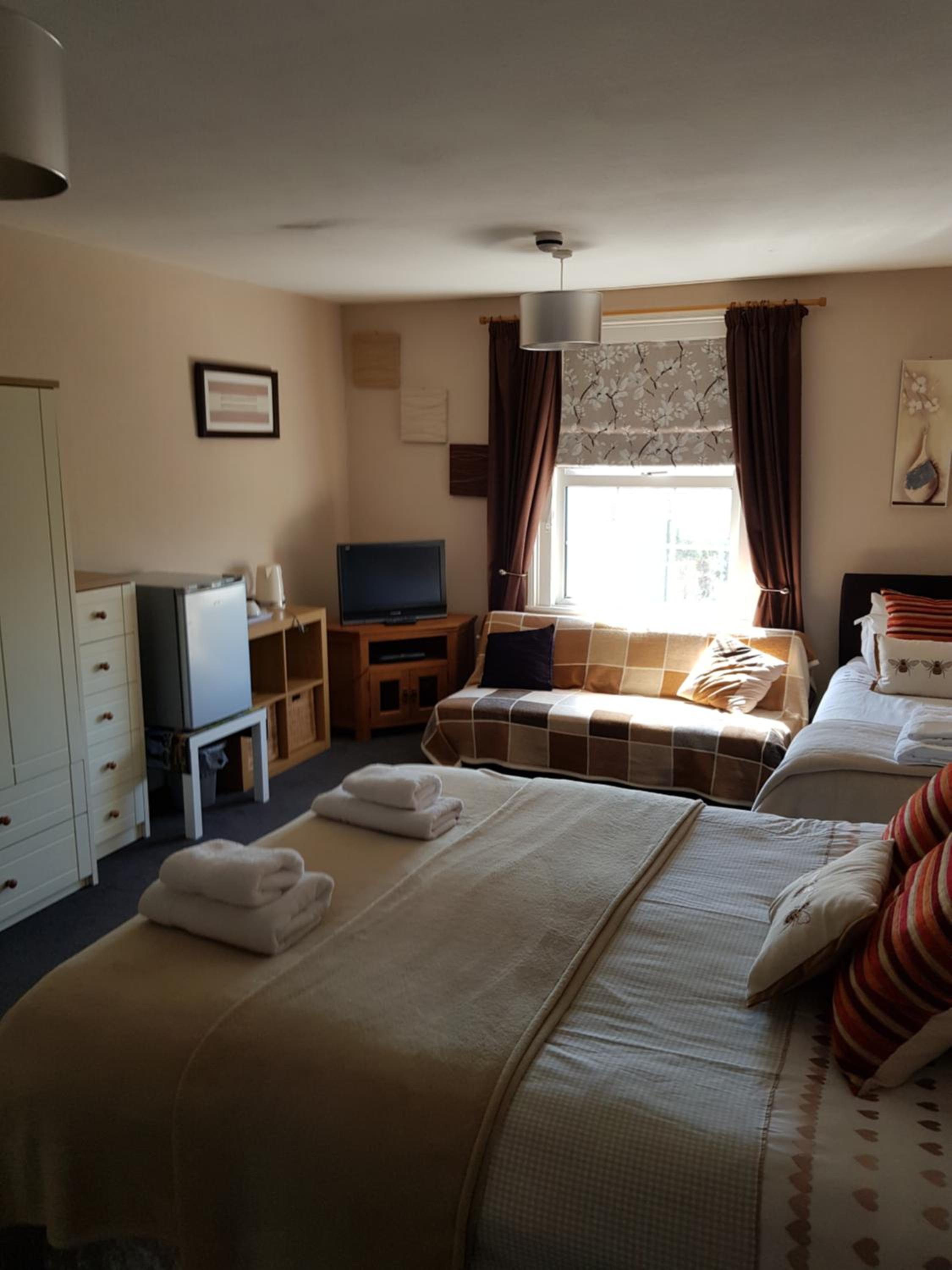 Deluxe Triple Room