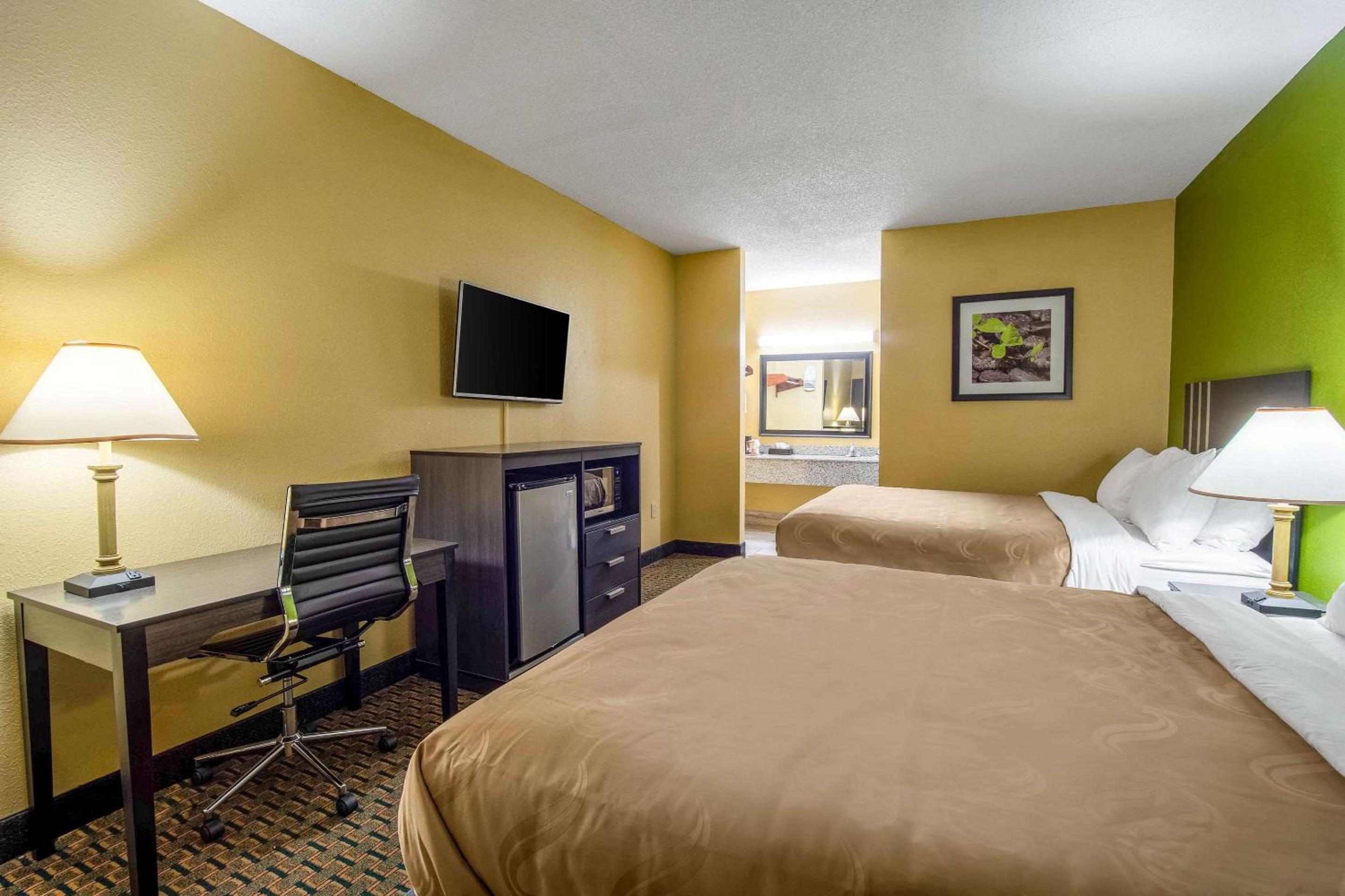 Queen Room with Two Queen Beds - Non-Smoking - Photo 1