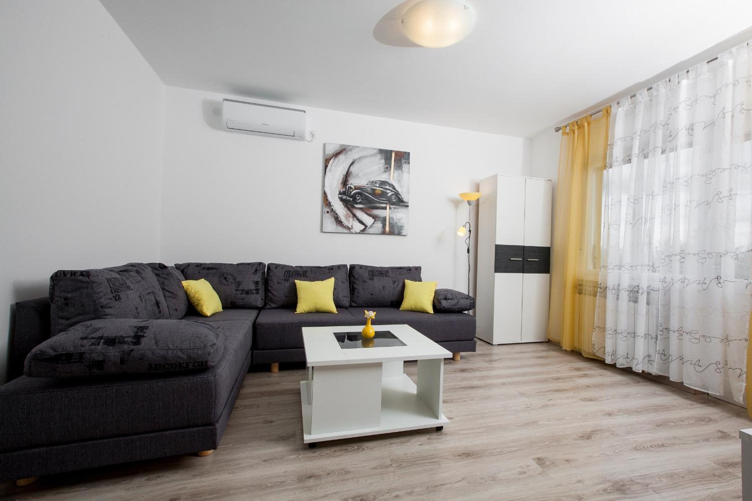 Three-Bedroom Apartment with Balcony and Sea View