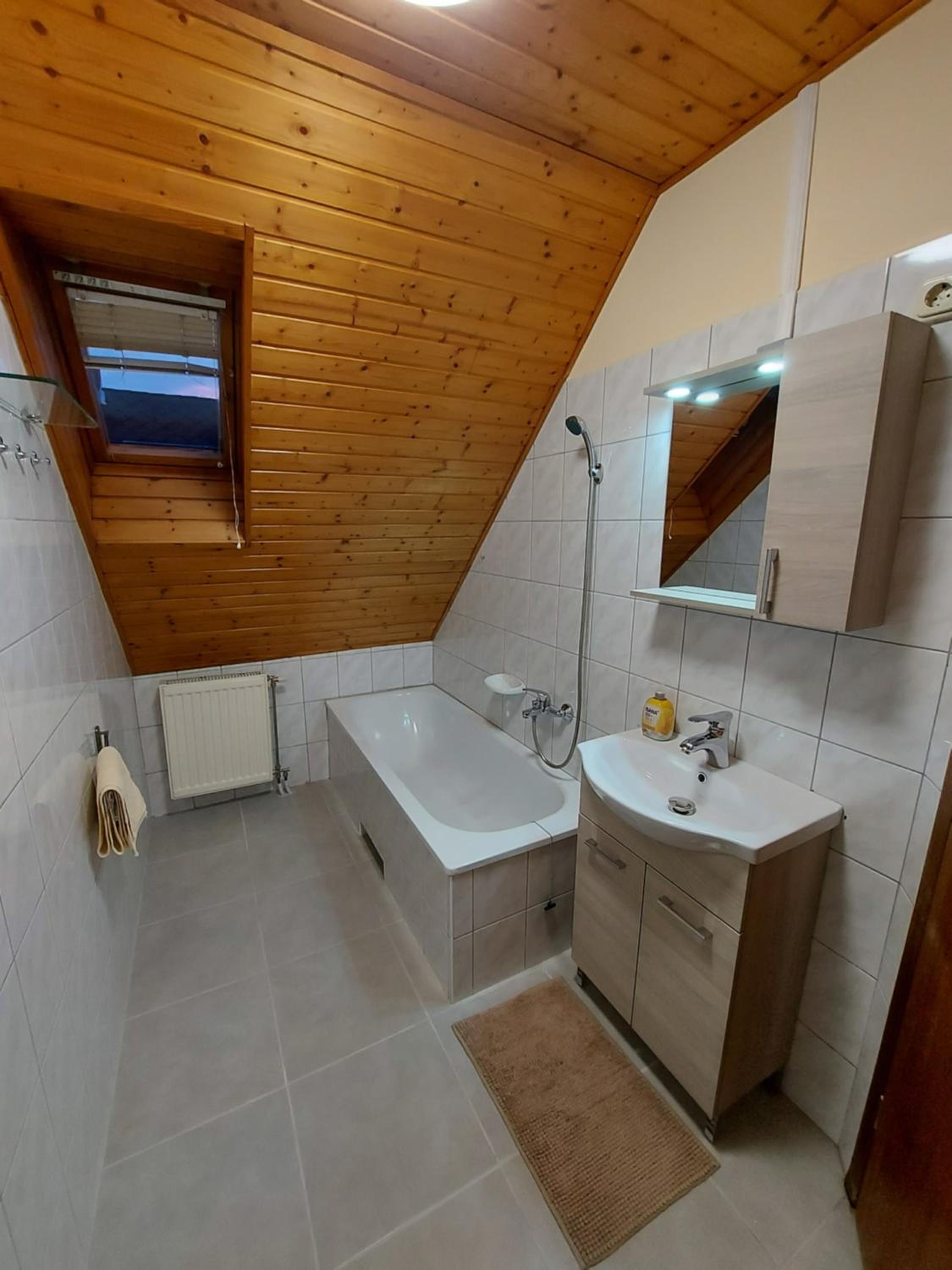 Three-Bedroom Apartment - Photo 32
