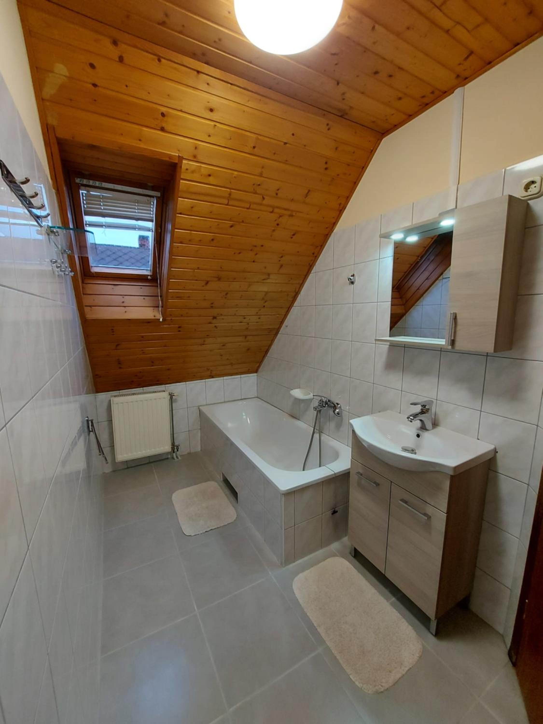Three-Bedroom Apartment - Photo 16