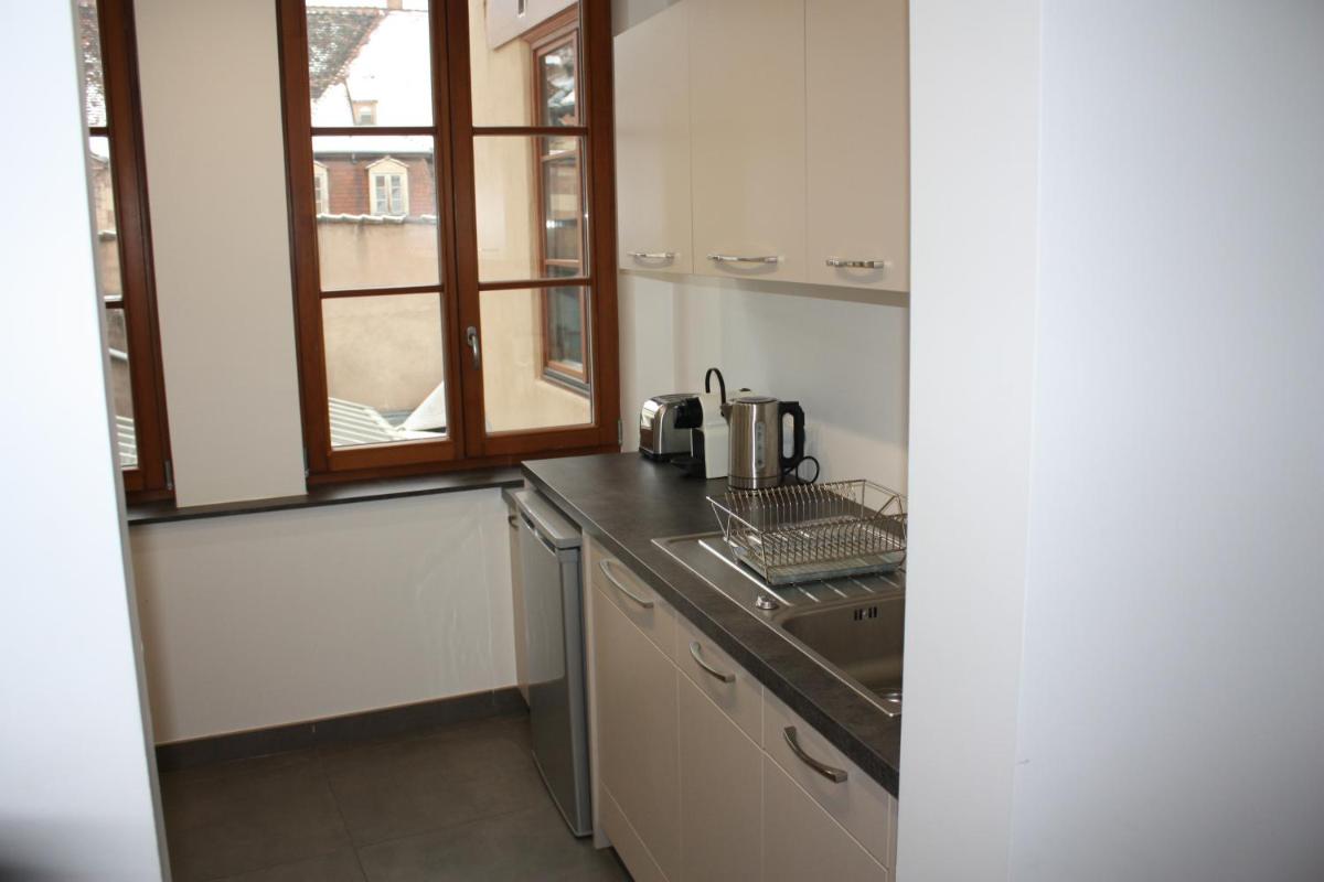 Three-Bedroom Apartment - 3rd Floor - Photo 1