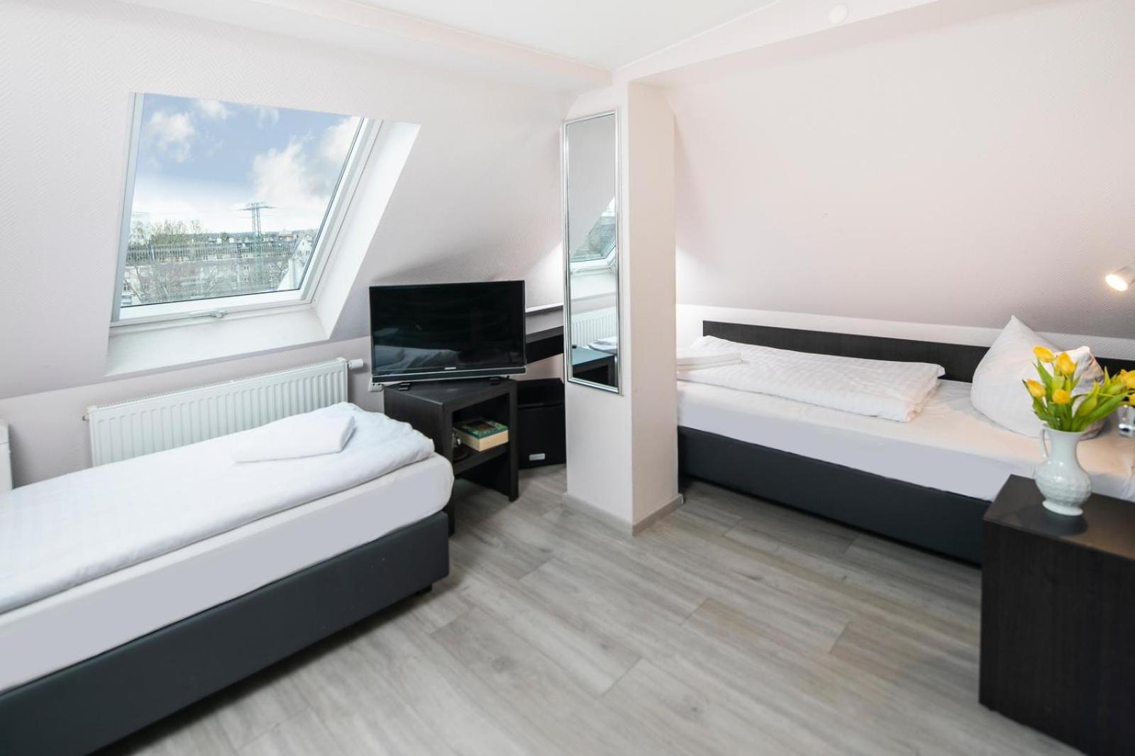 Comfort Twin Room with air condition and roof slope photo 1