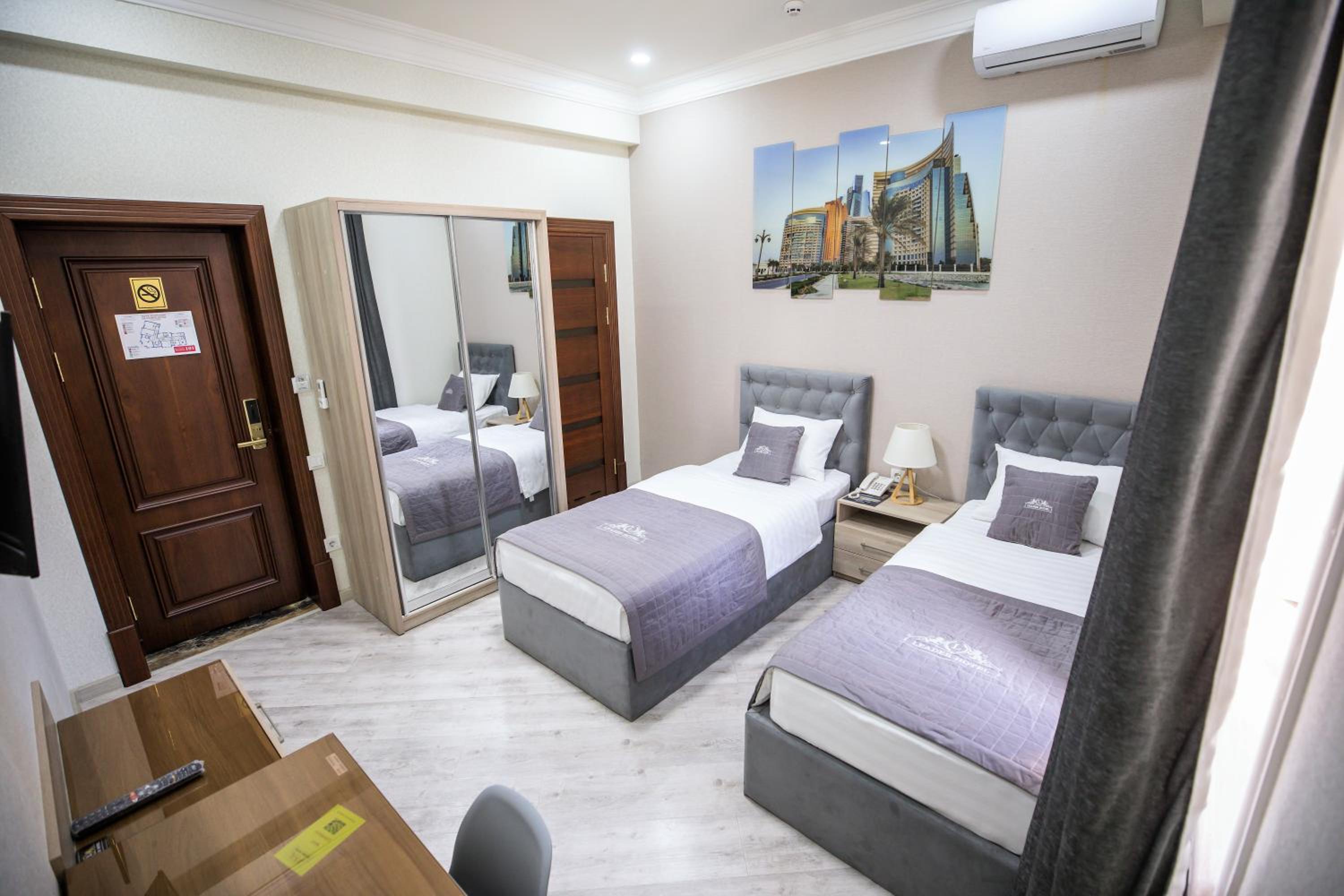 Standard Twin Room - Photo 4