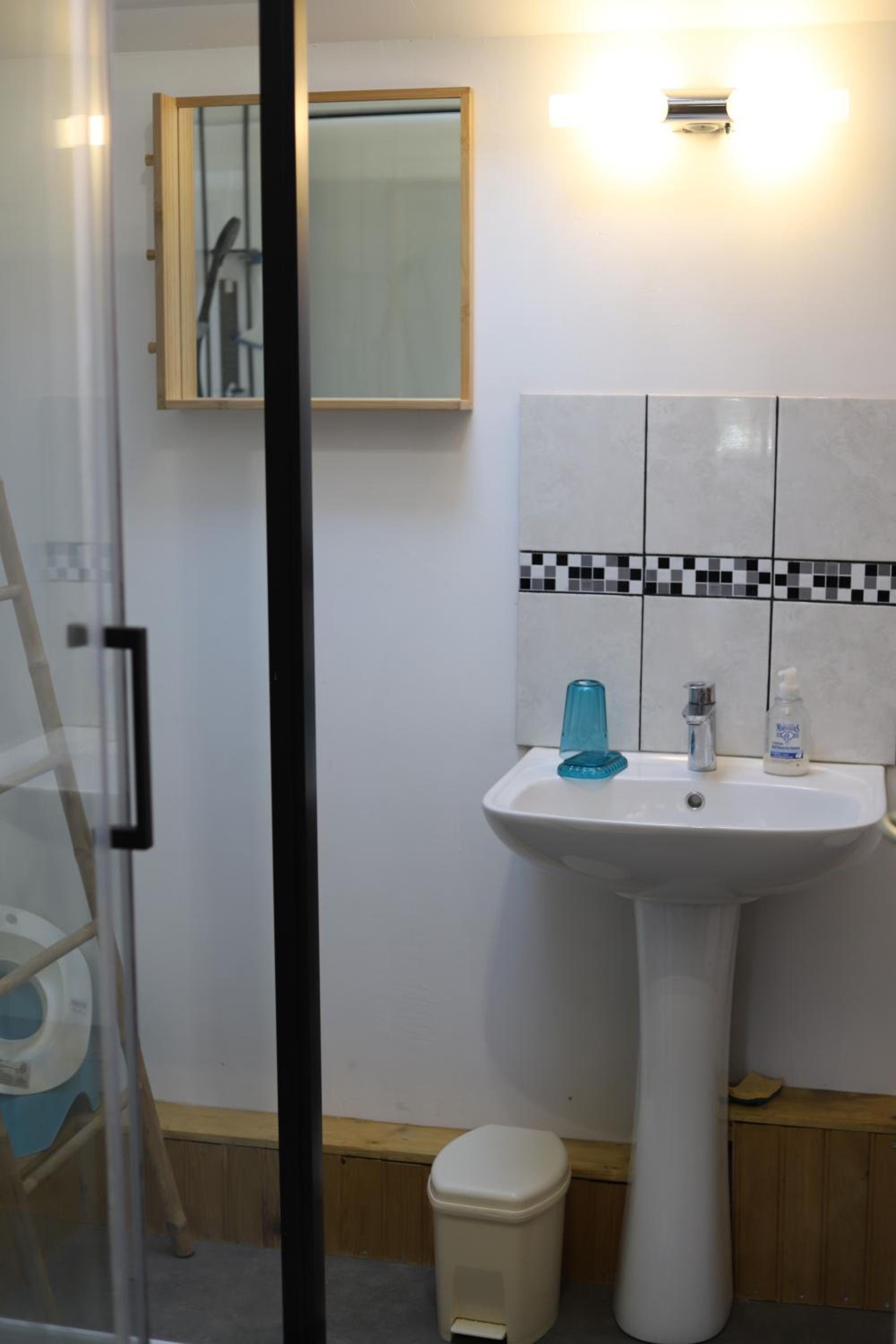 Three-Bedroom House - Photo 37