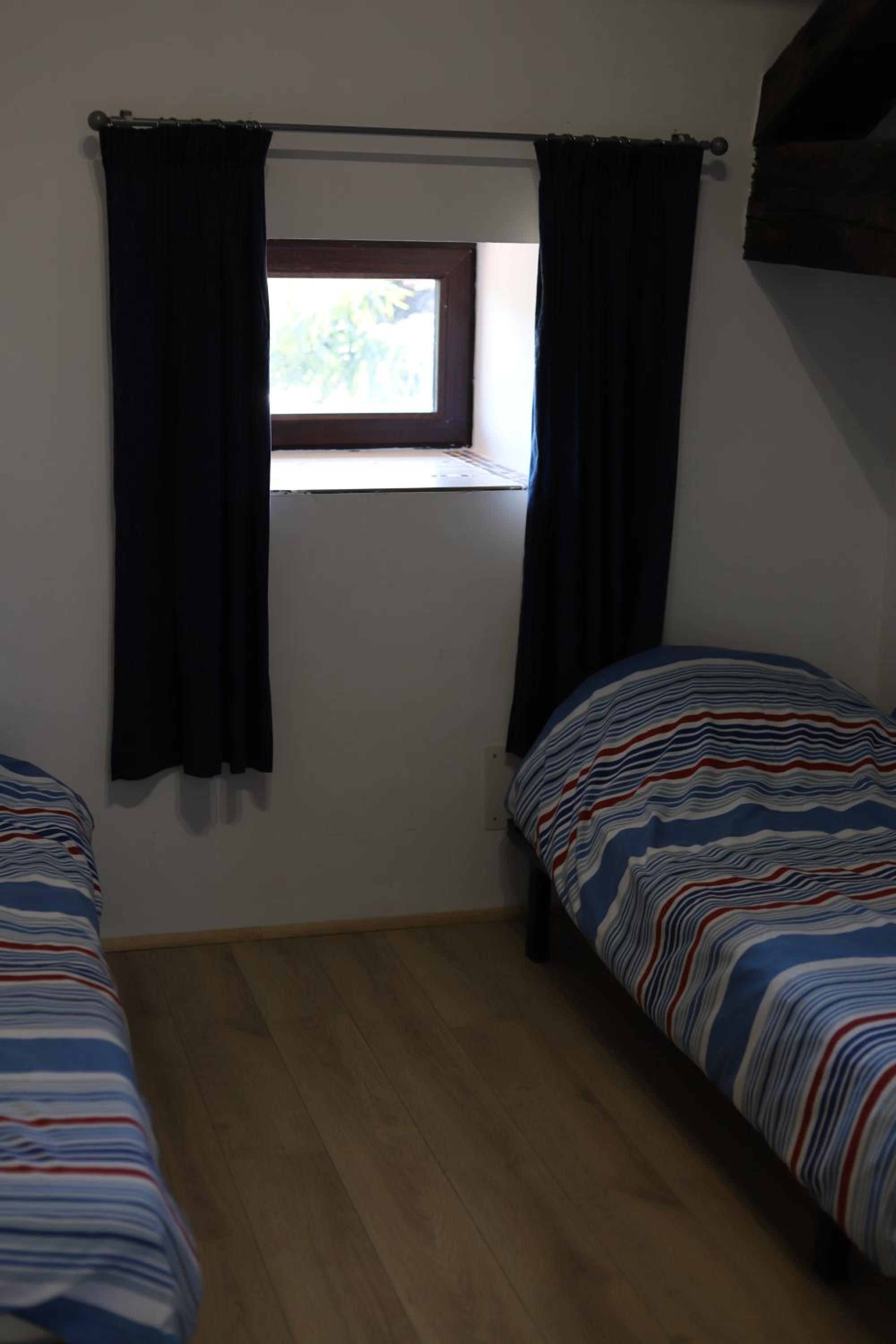 Three-Bedroom House - Photo 35