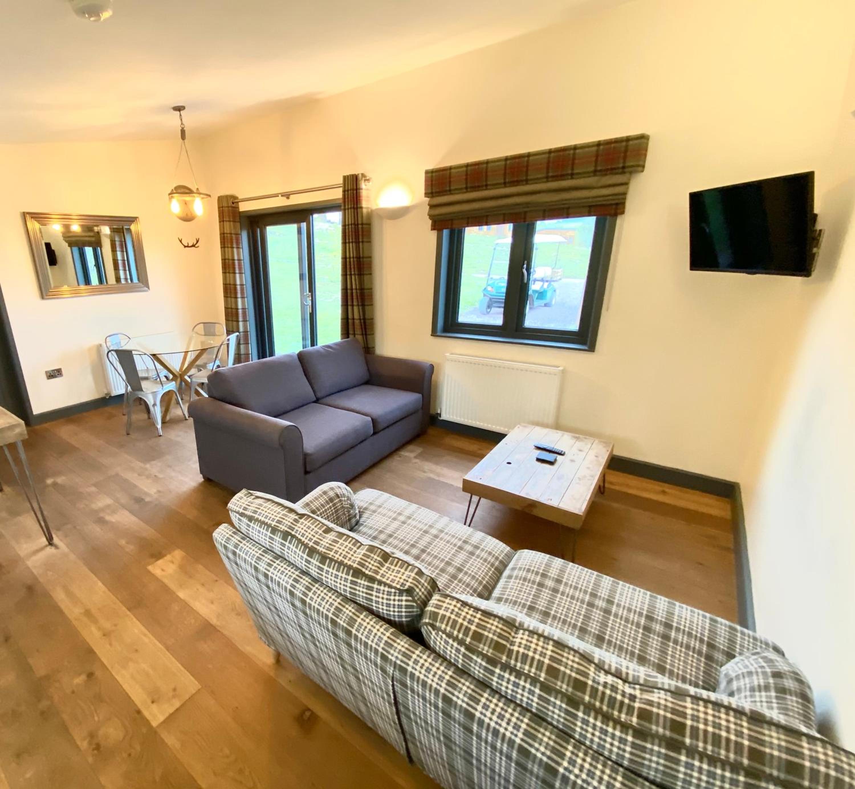Deluxe Lodge with Hot Tub - Photo 1