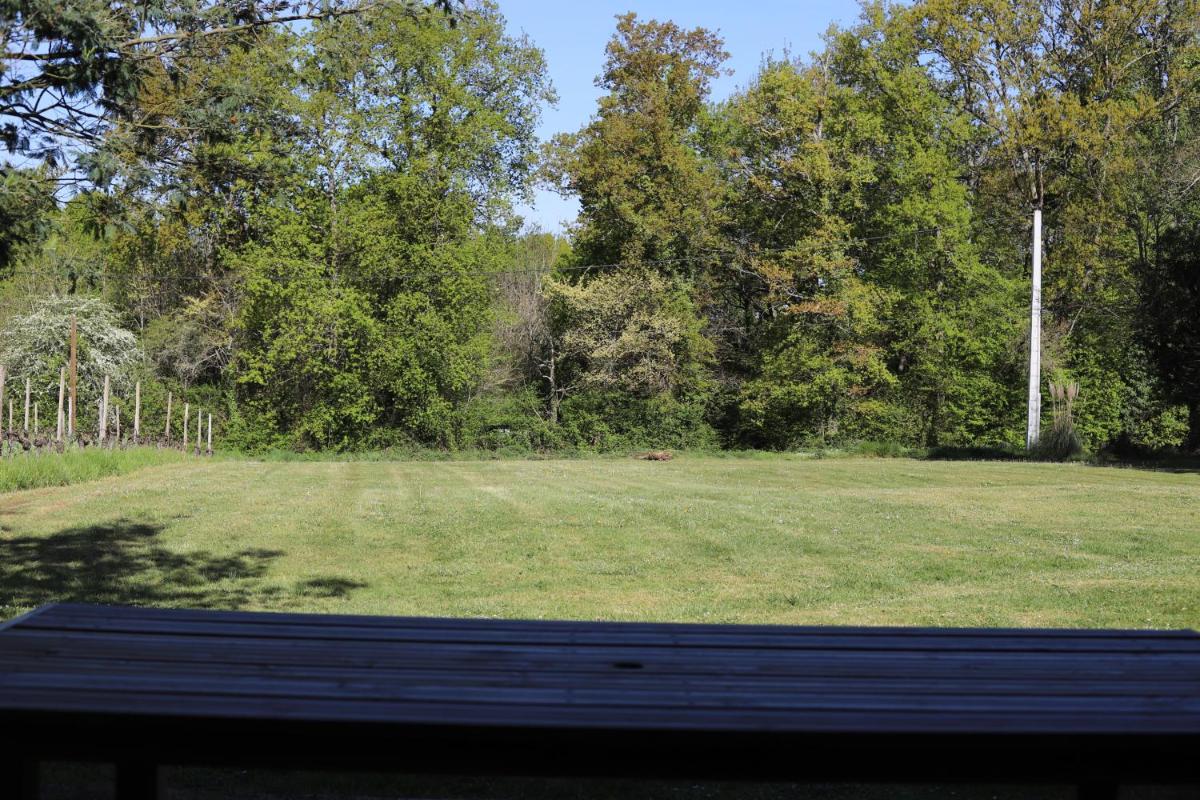 Three-Bedroom House - Photo 22