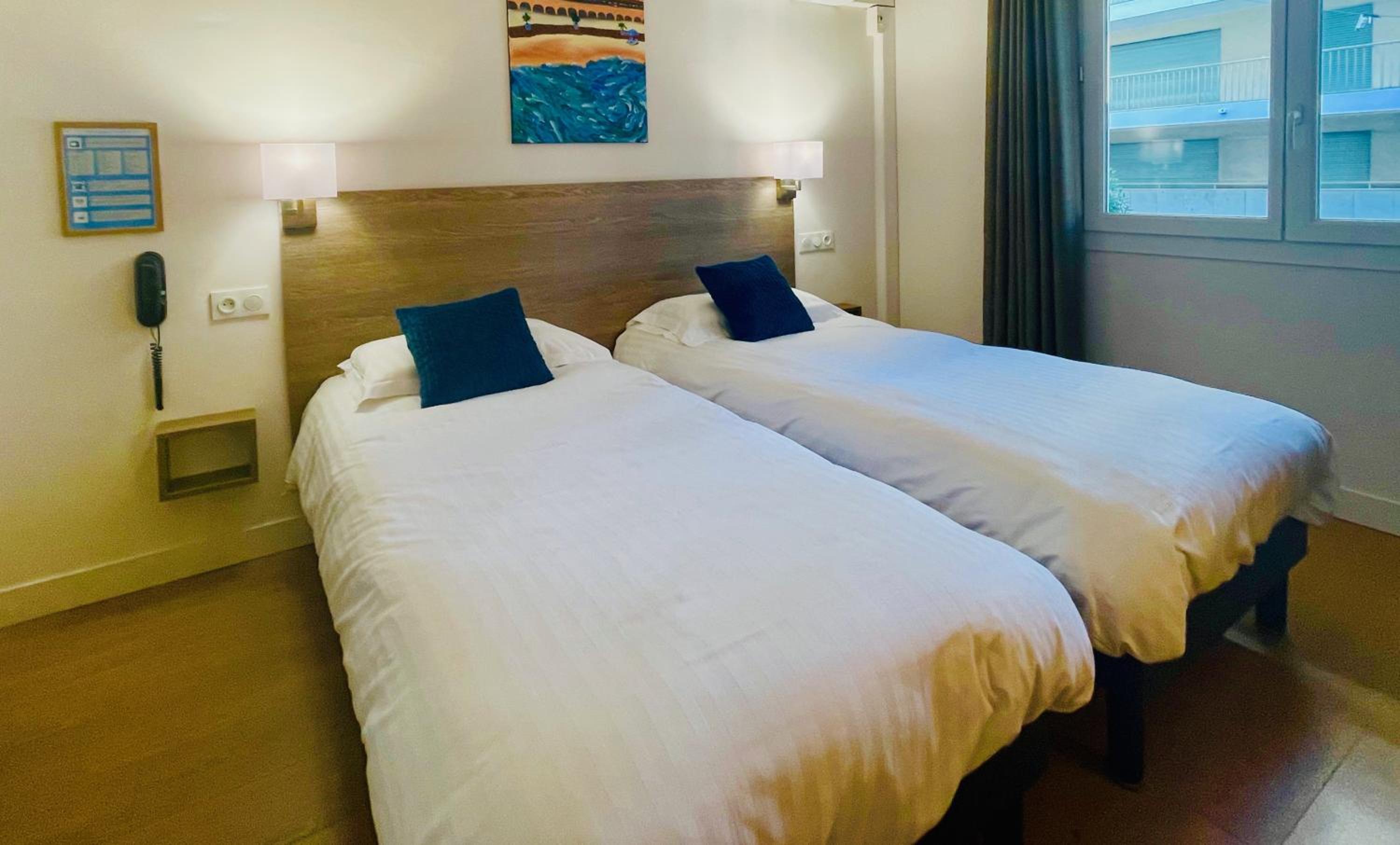 Economy Twin Room - Photo 1