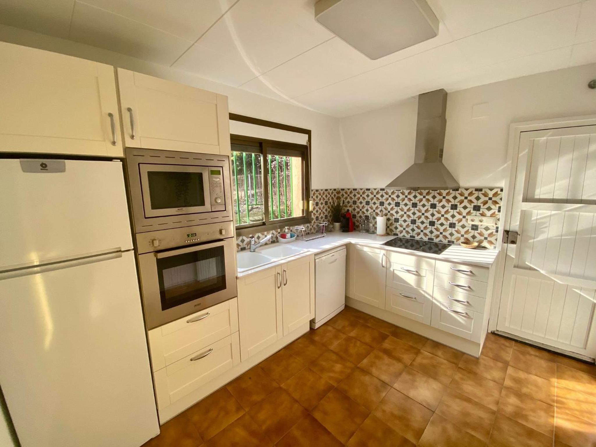 Three-Bedroom House photo 3
