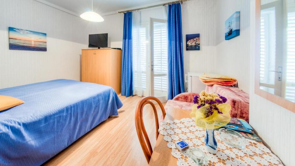 Superior Triple Room with Balcony and Sea View