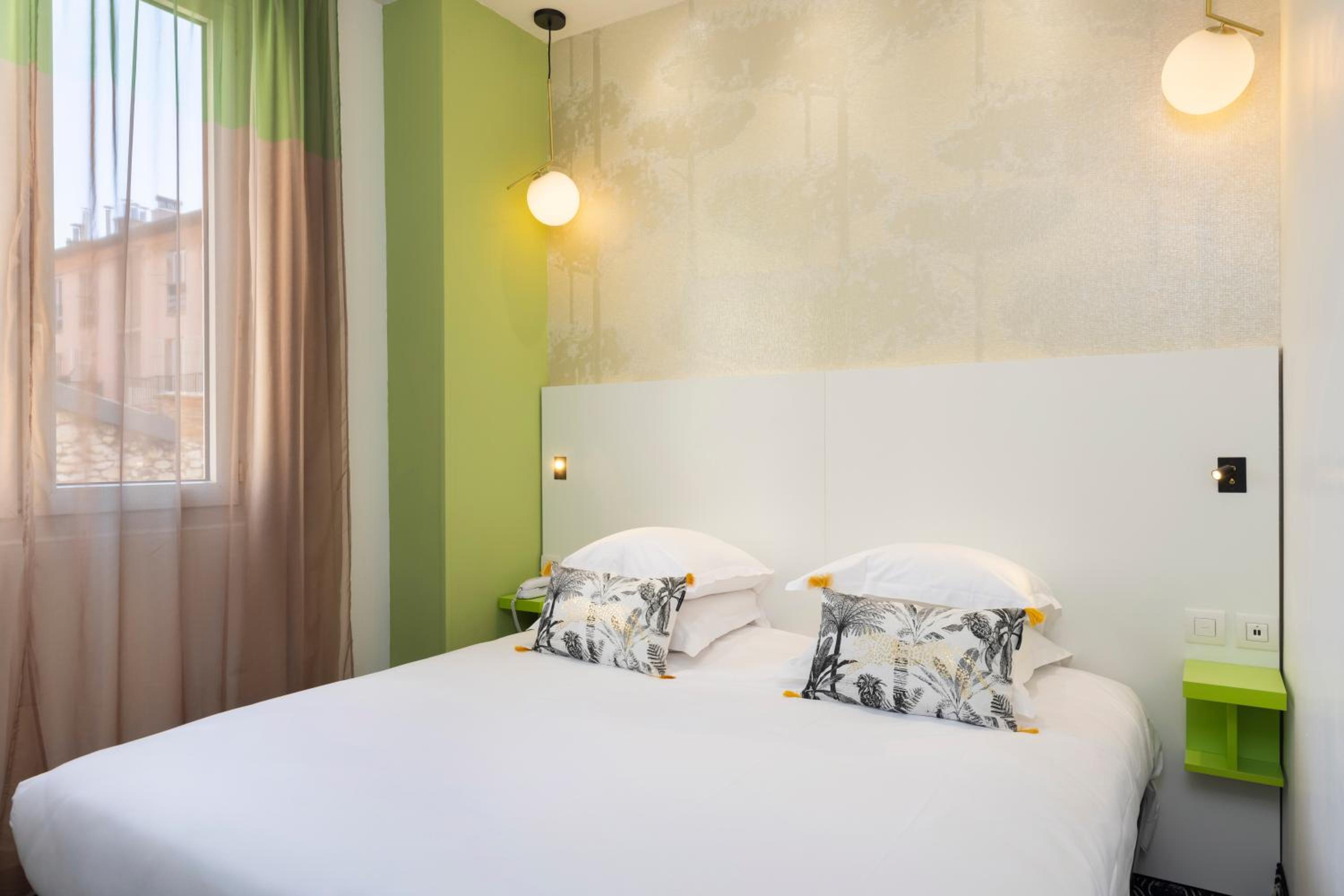 Relax in our cozy, vibrant sleeping space!