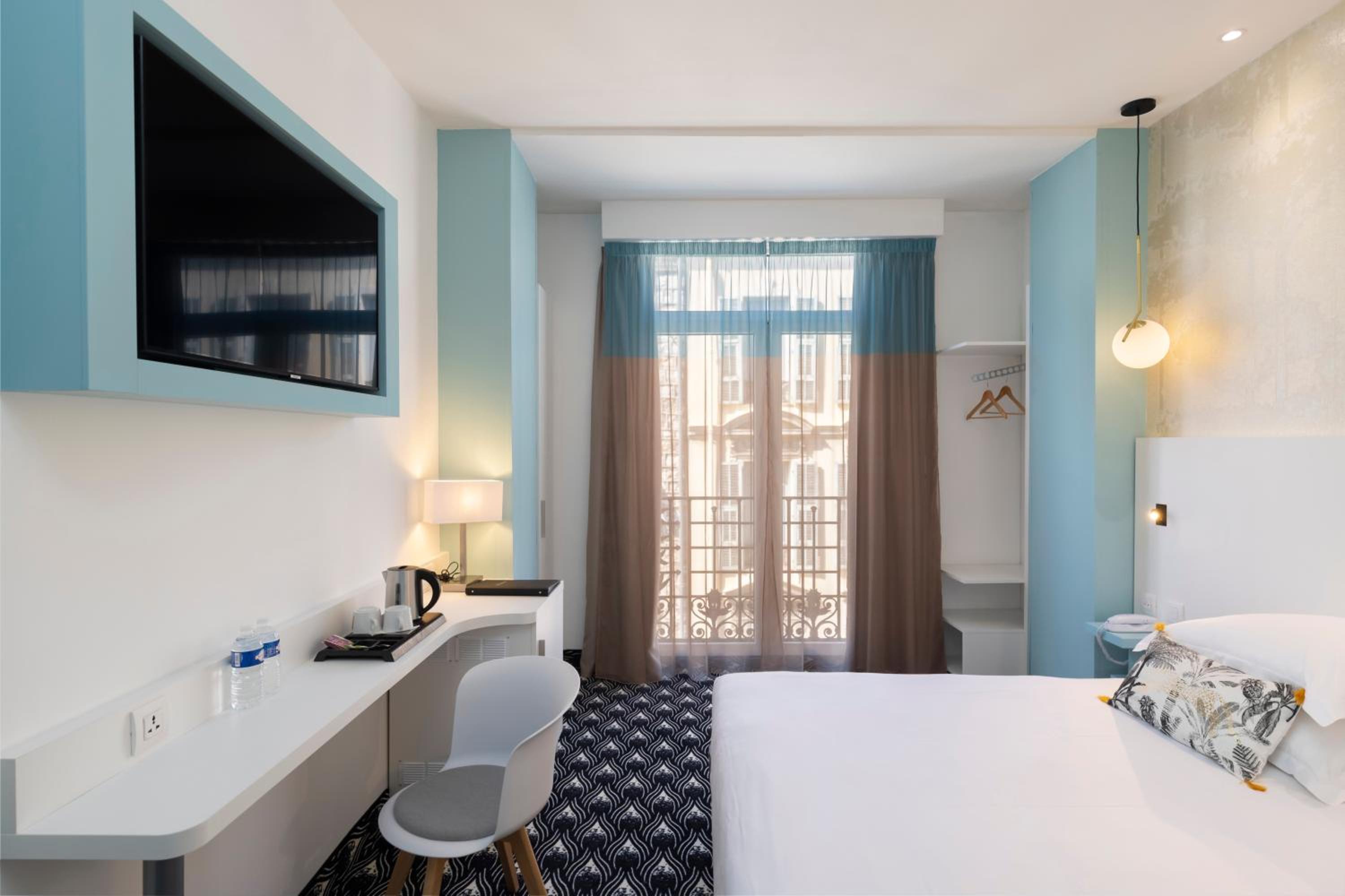 Relax in this modern, stylish hotel room retreat.