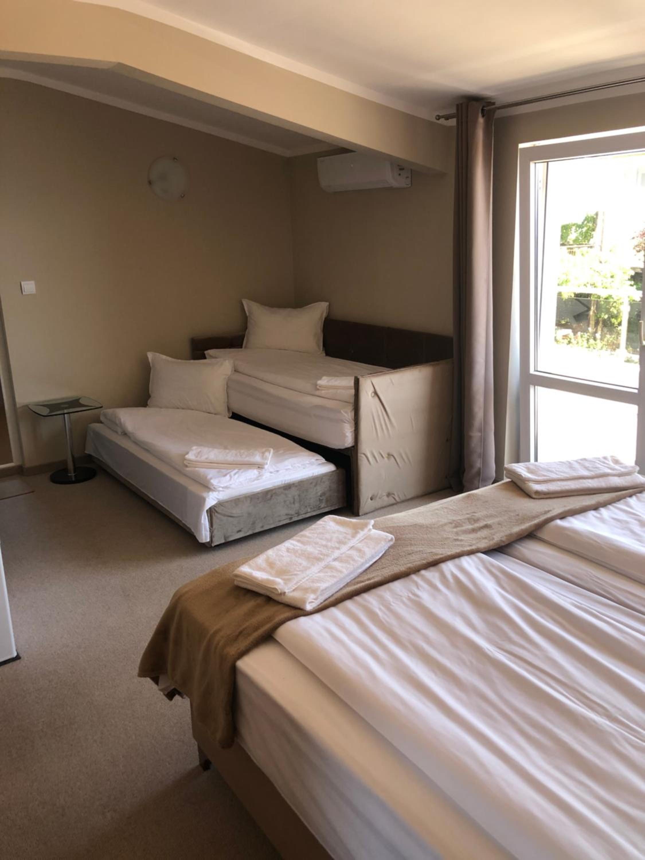 Deluxe Triple Room with Side Sea View