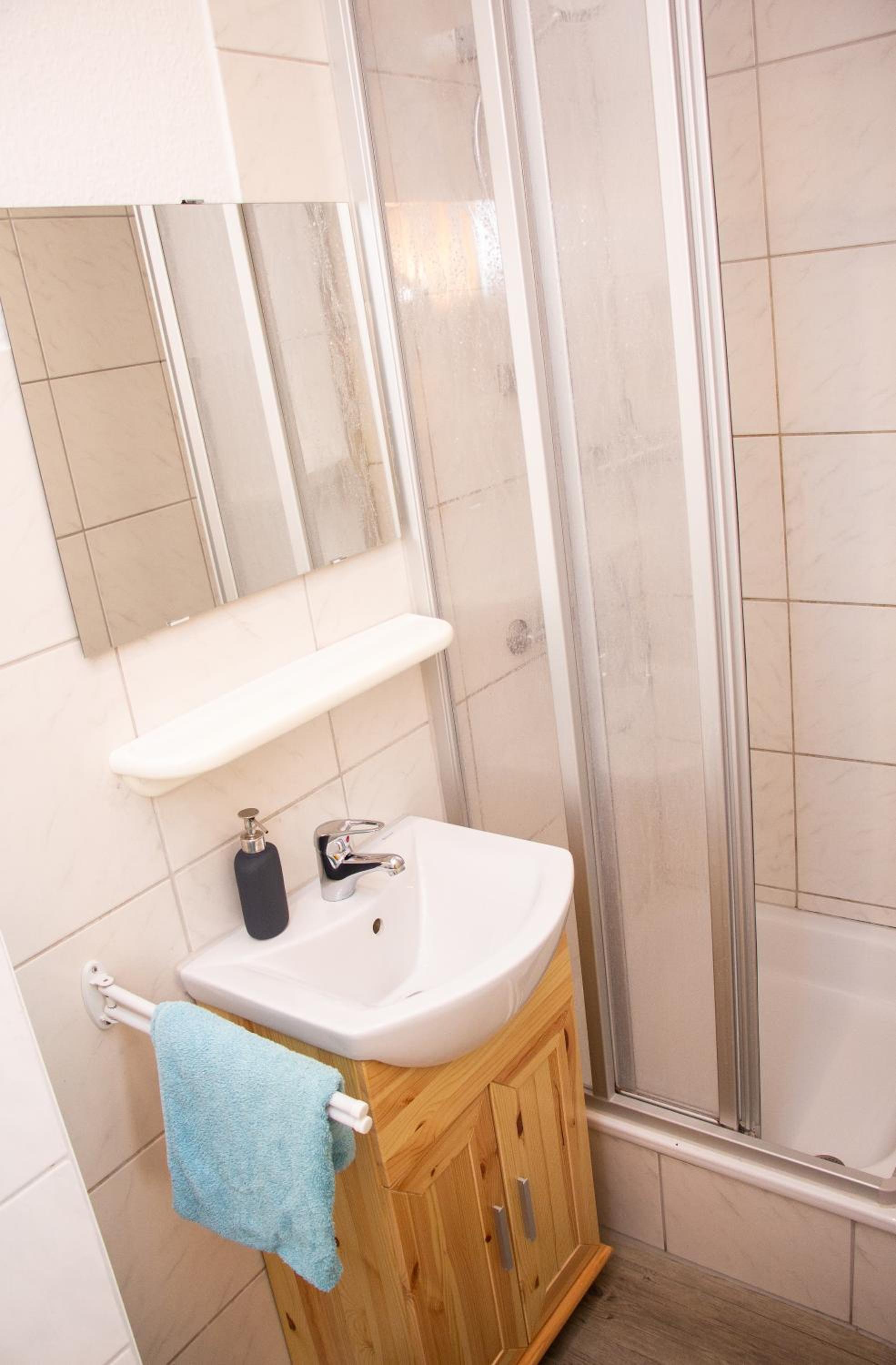 Apartment with Shower - Photo 11