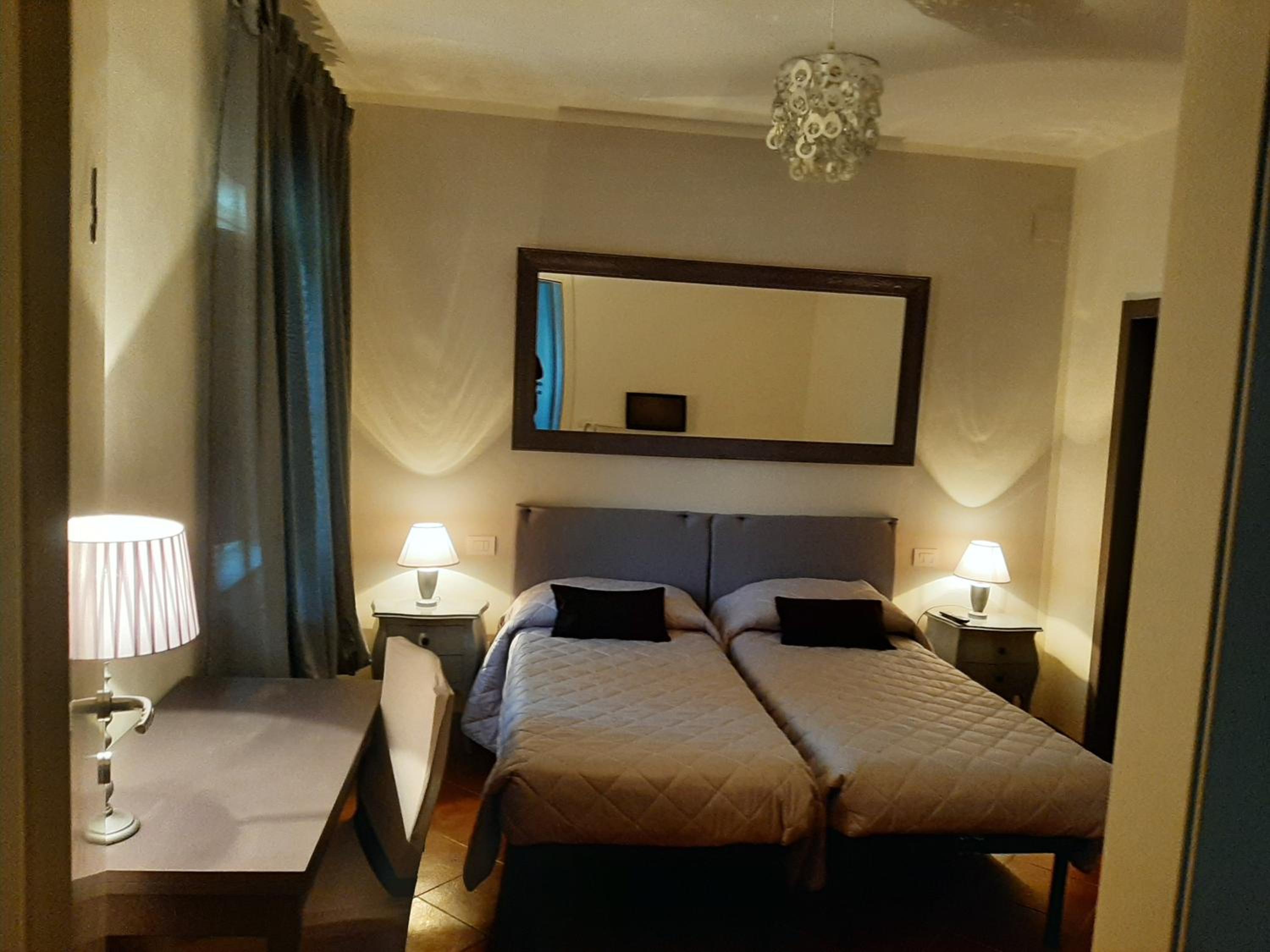 Standard Quadruple Room - Photo 33