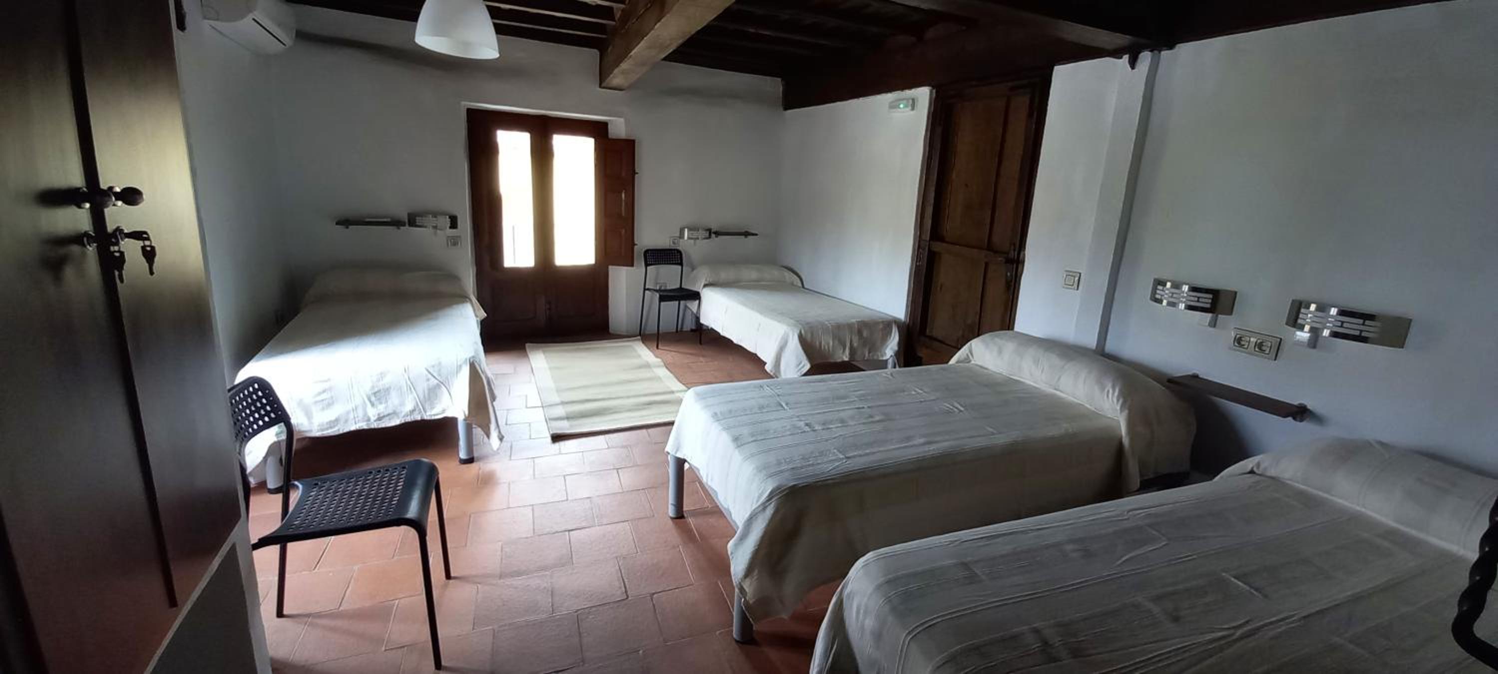 Cama en habitación compartida de 4 camas