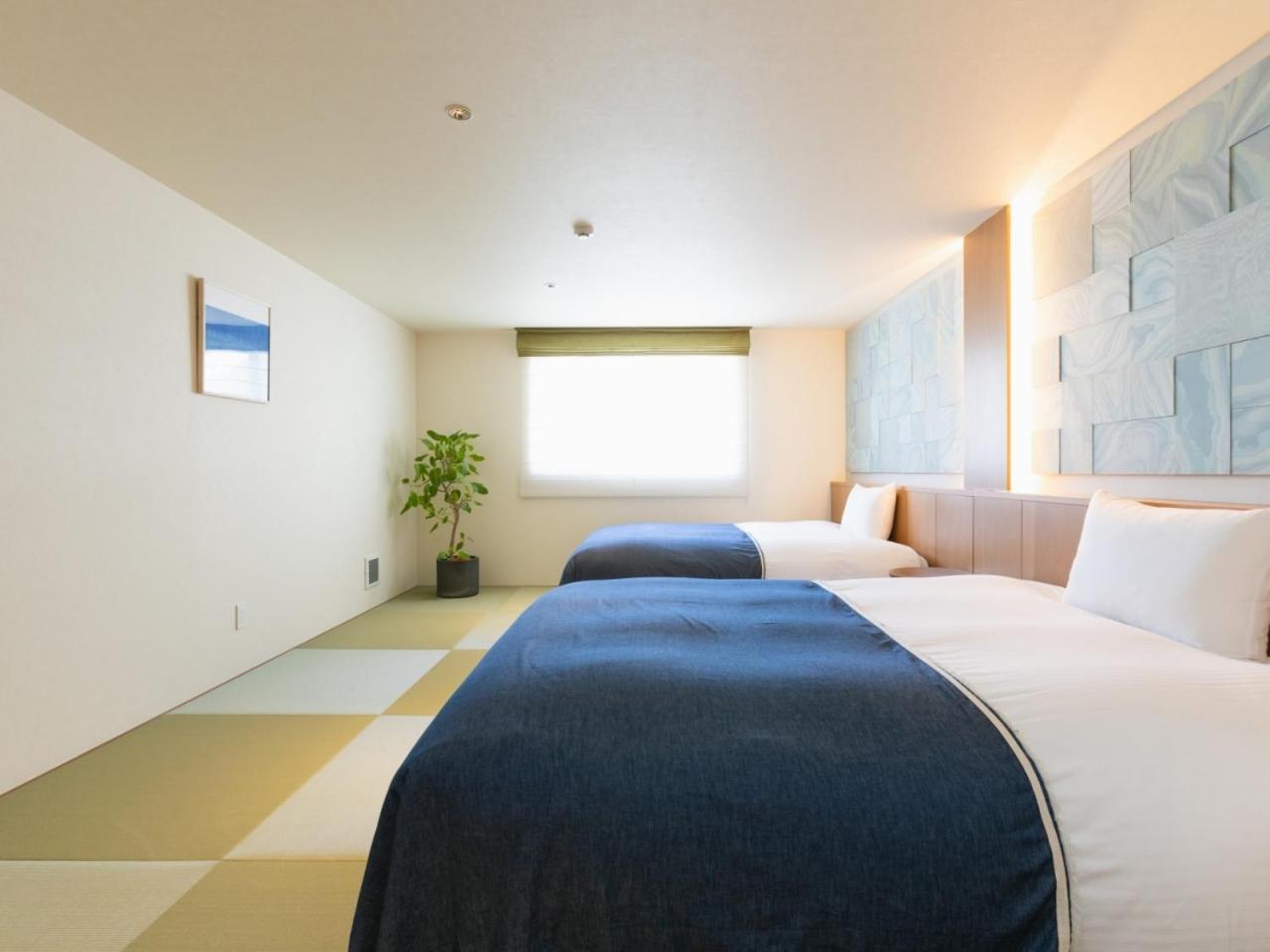 Twin Suite Room with Tatami Area - Photo 8