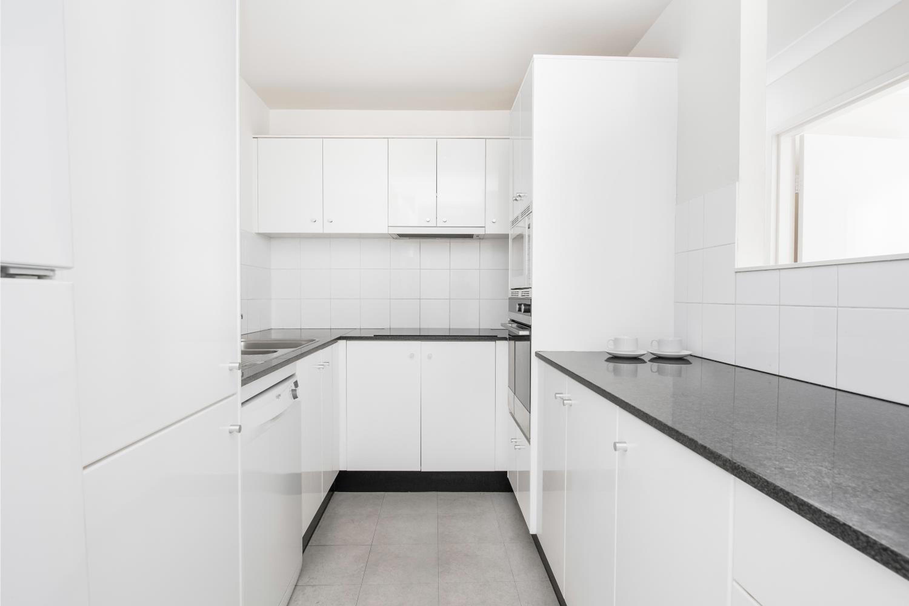 Three-Bedroom Apartment - Photo 5