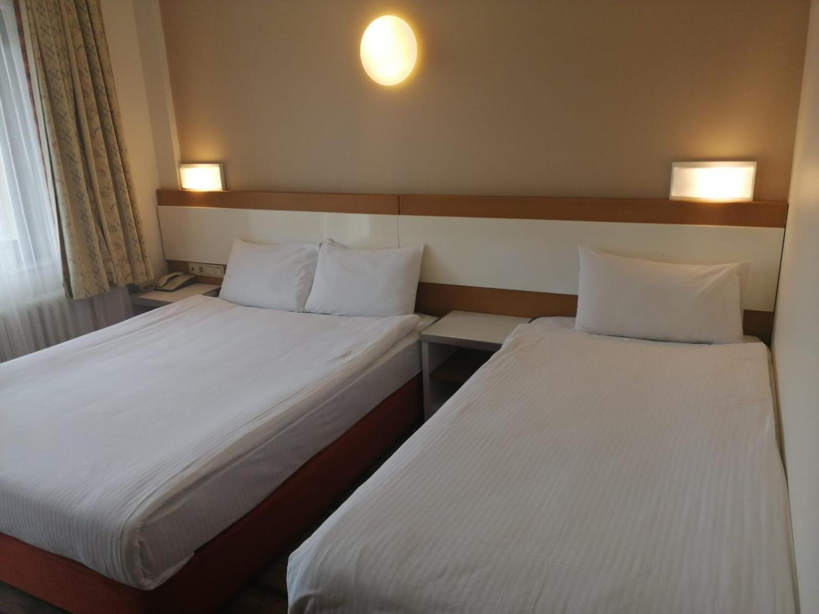 Standard Twin Room - Photo 7