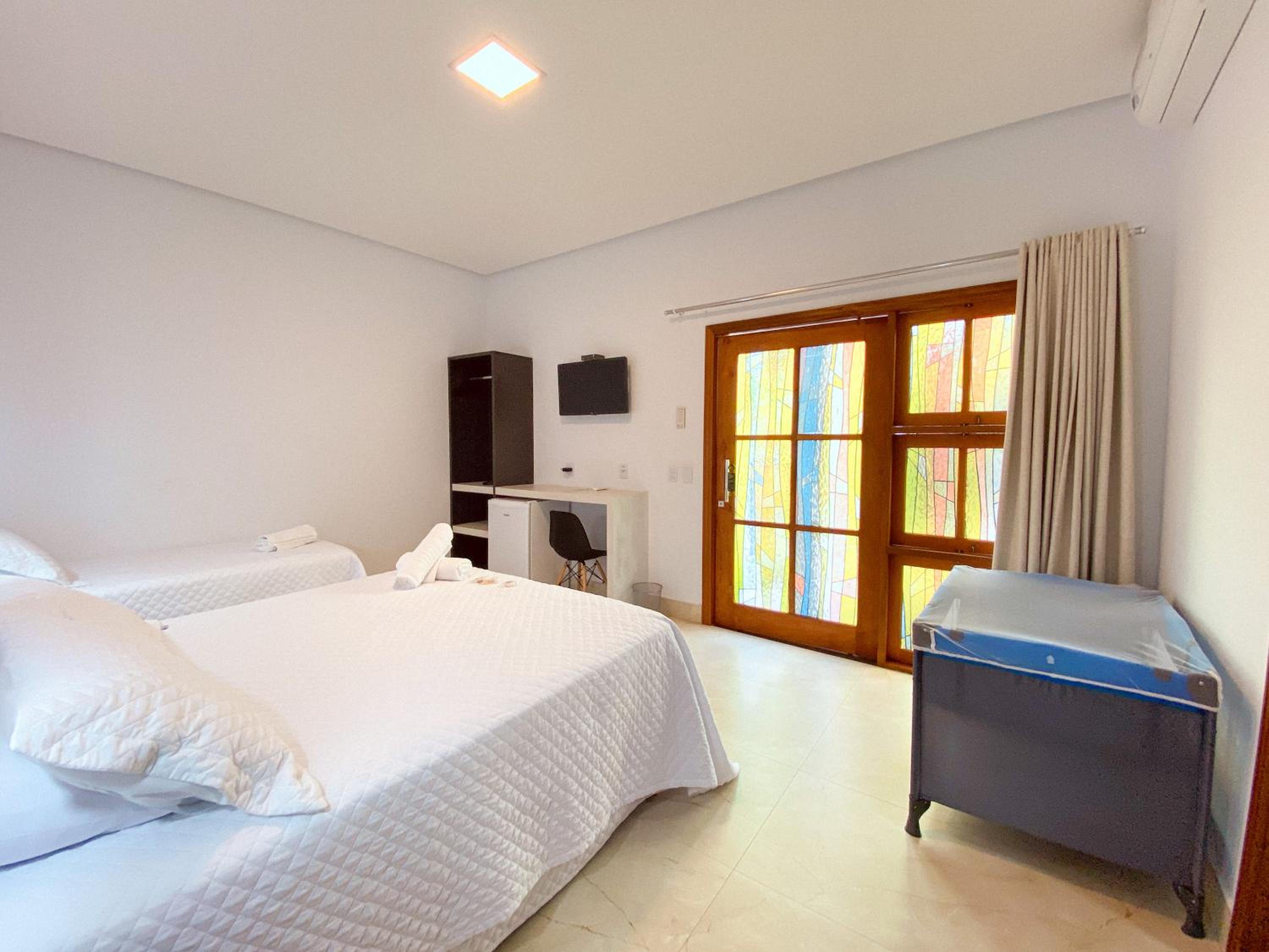 Deluxe Triple Room - Photo 11