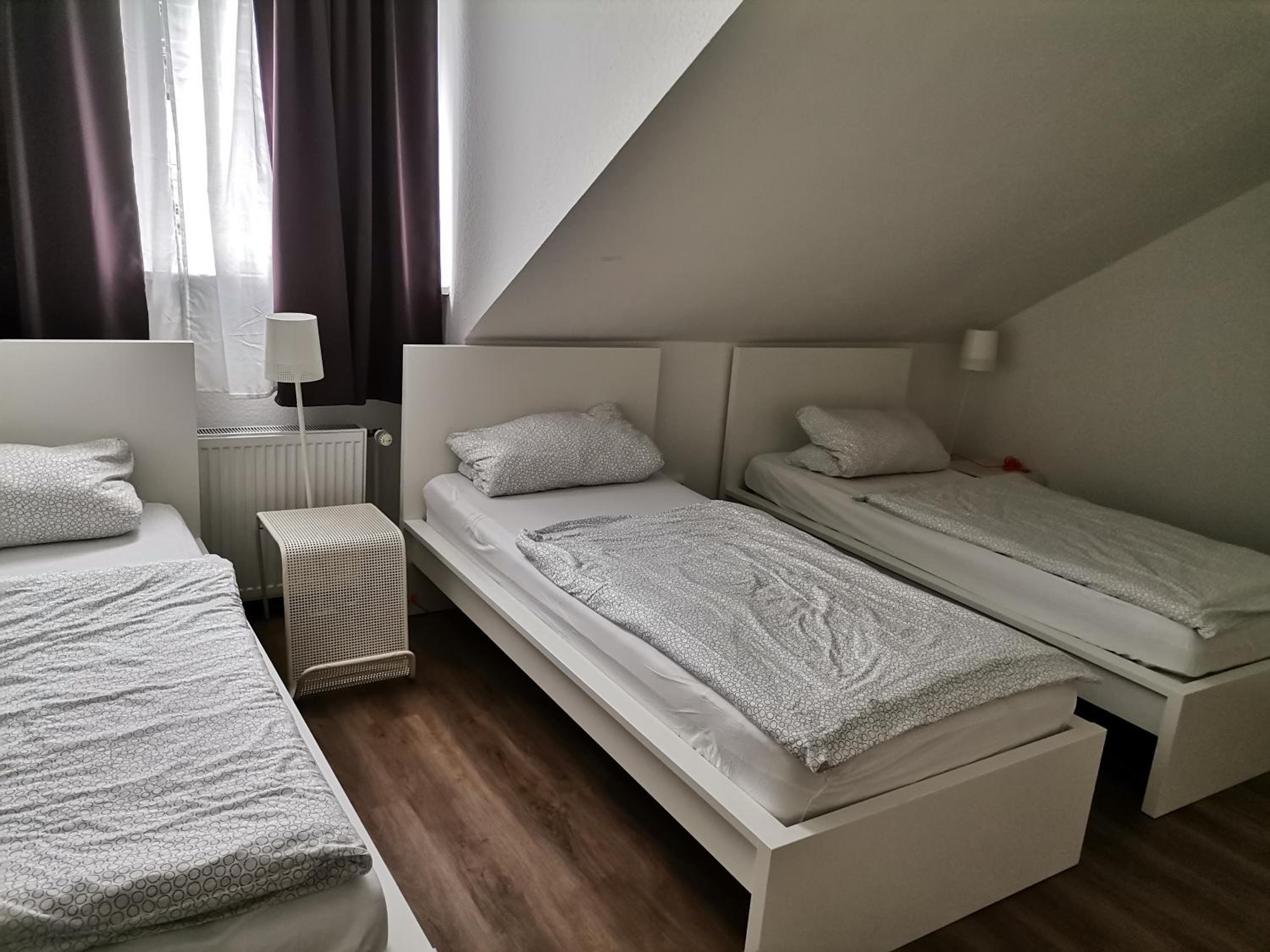 Three-Bedroom Apartment - Photo 13