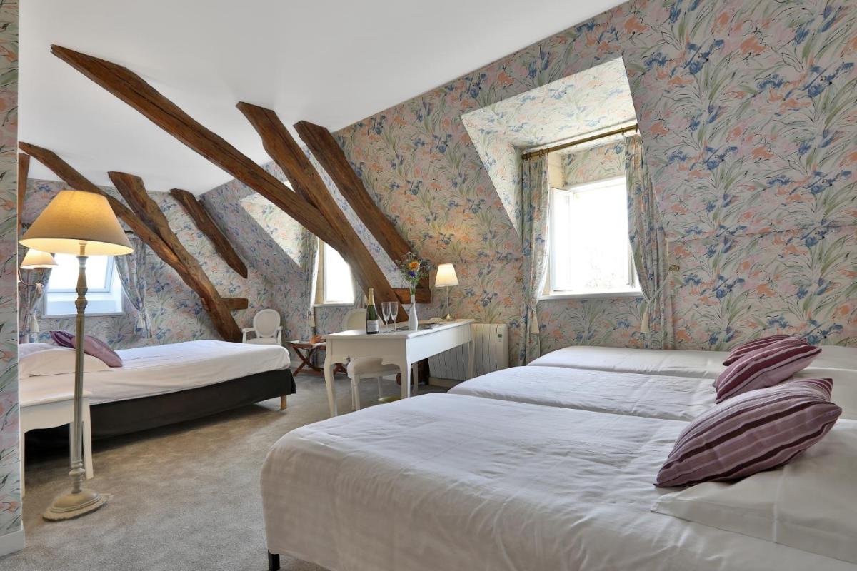Deluxe Family Suite - Photo 9
