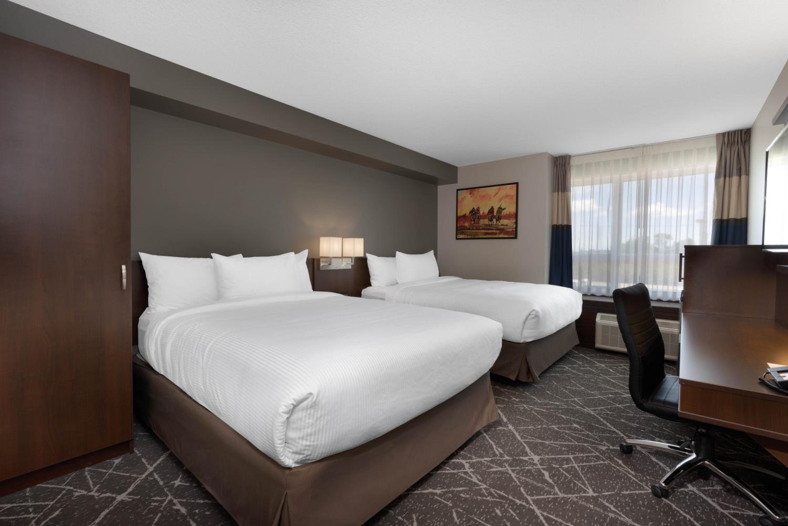 Queen Room with Two Queen Beds and Shower - Non-Smoking - Photo 1