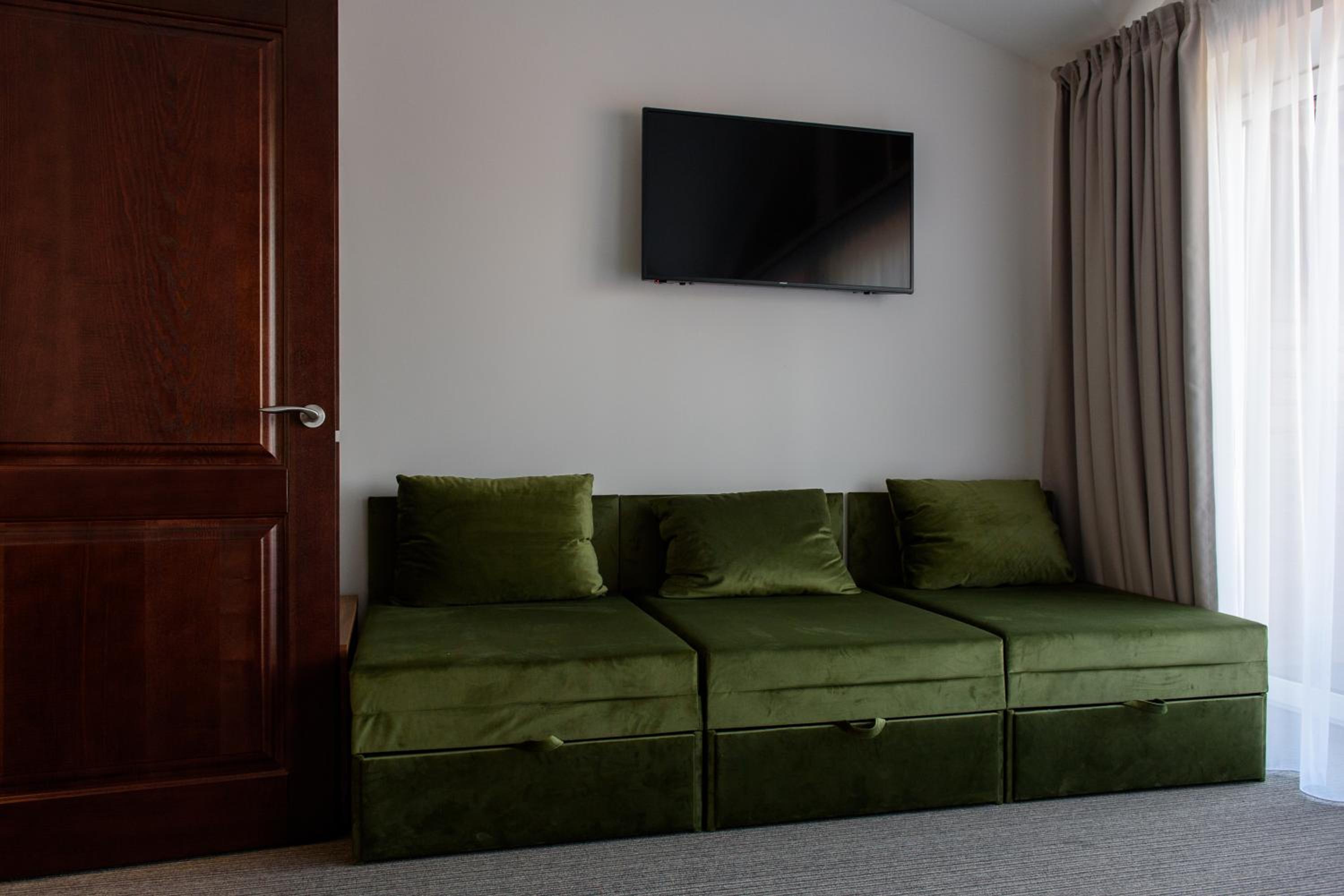 Family Room with Balcony - Photo 3
