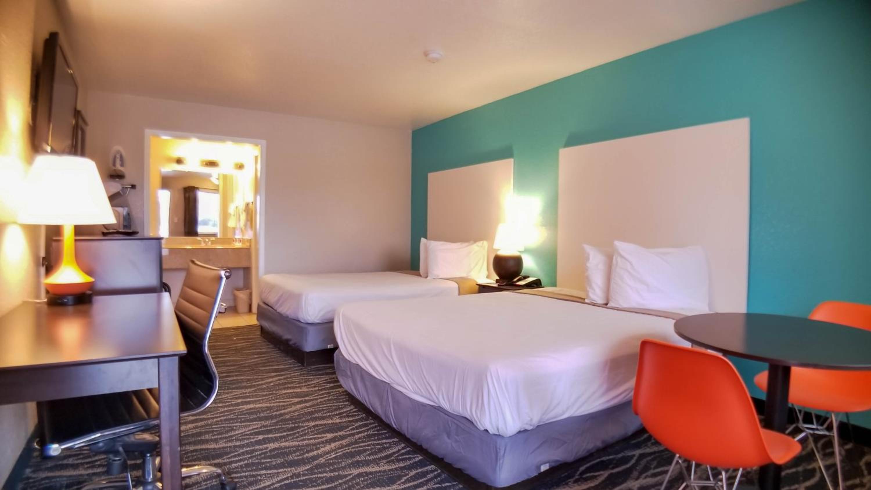 Queen Room with Two Queen Beds - Smoking - Photo 1