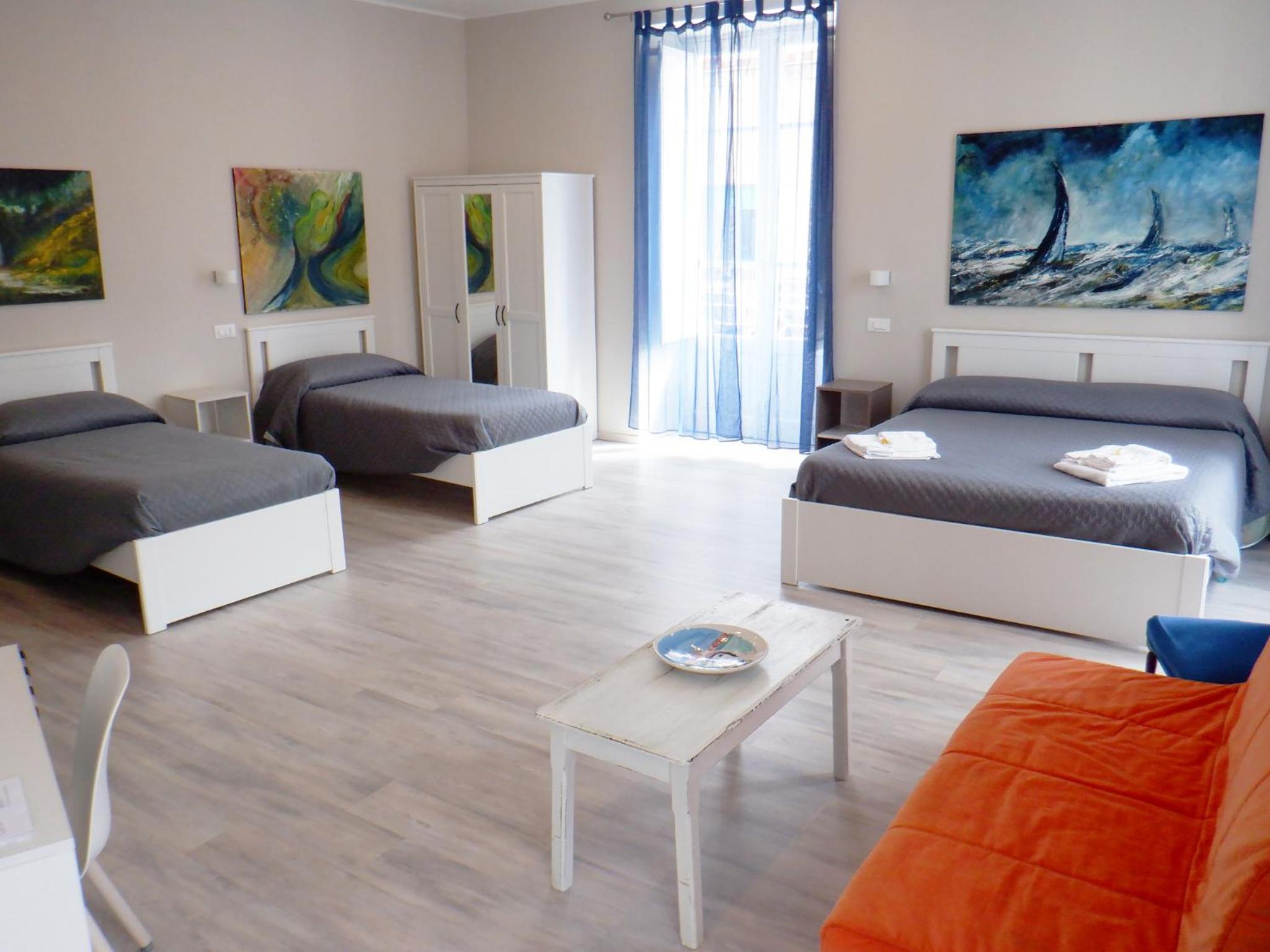 Quadruple Room with Private Bathroom - Photo 1
