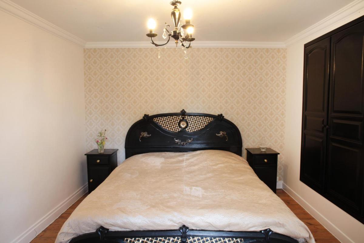 Deluxe King Room - Photo 7