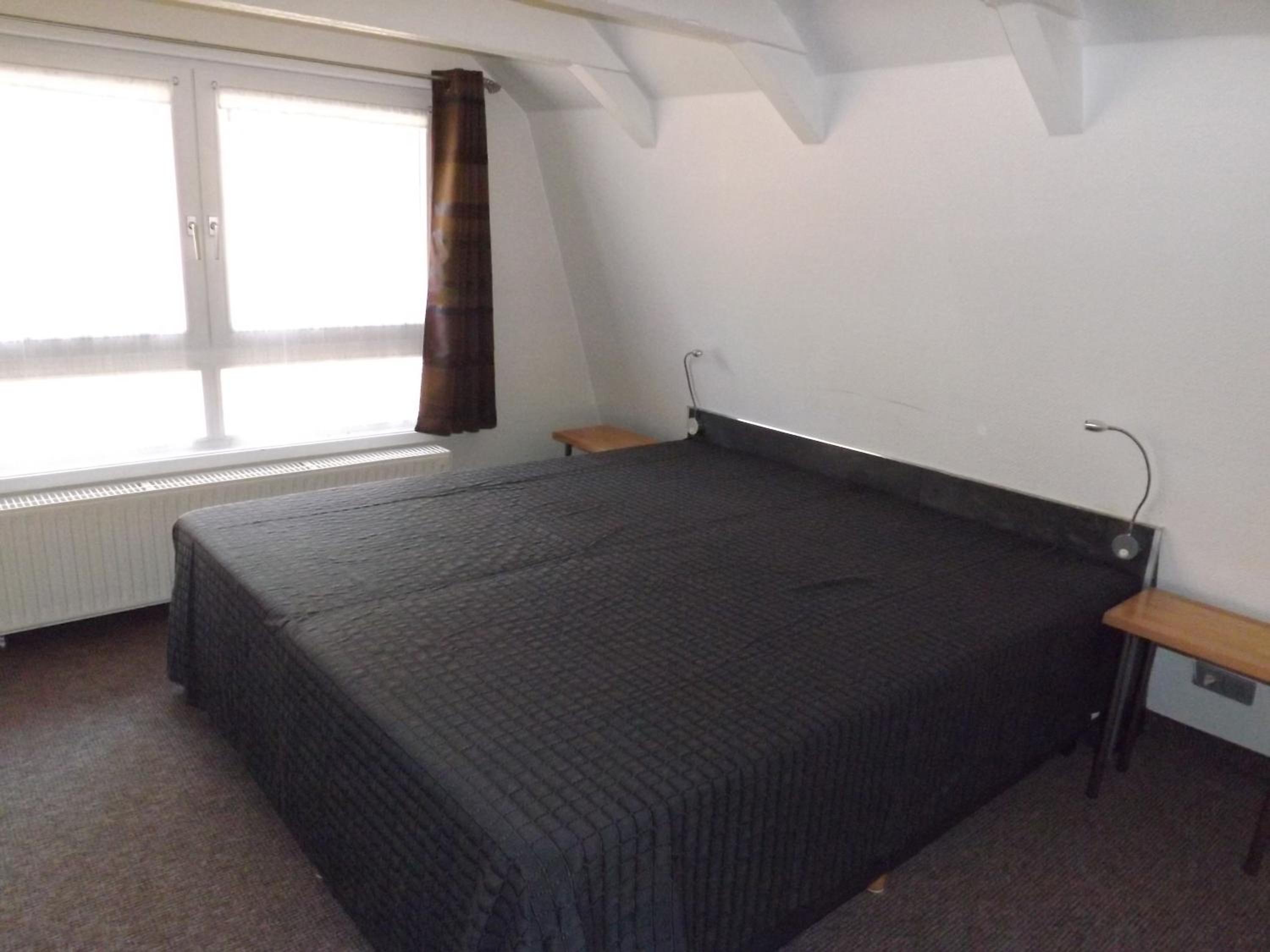 Three-Bedroom Apartment photo 2