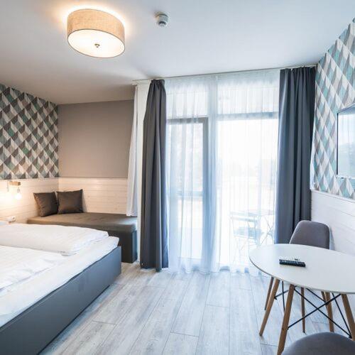 Deluxe Room (2 Adults + 1 Child) - Photo 1