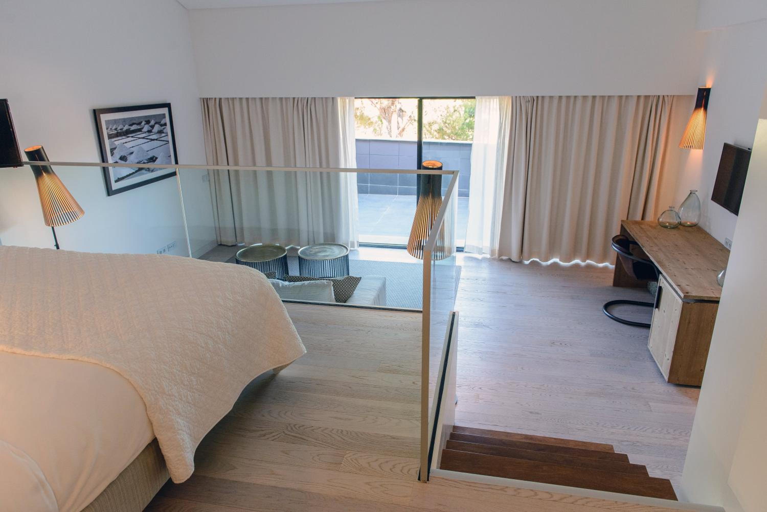 view from the top of the stairs to the bedroom