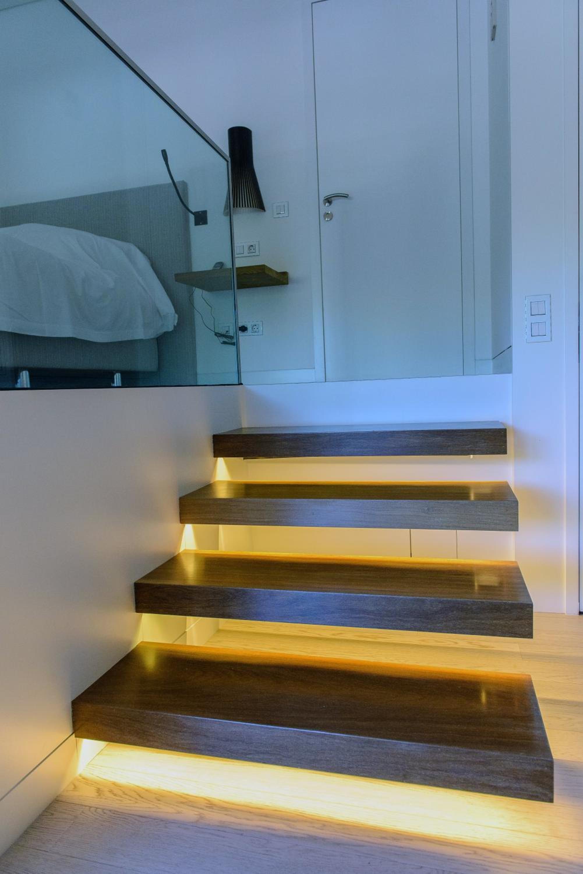 set of stairs that are lit up with leds