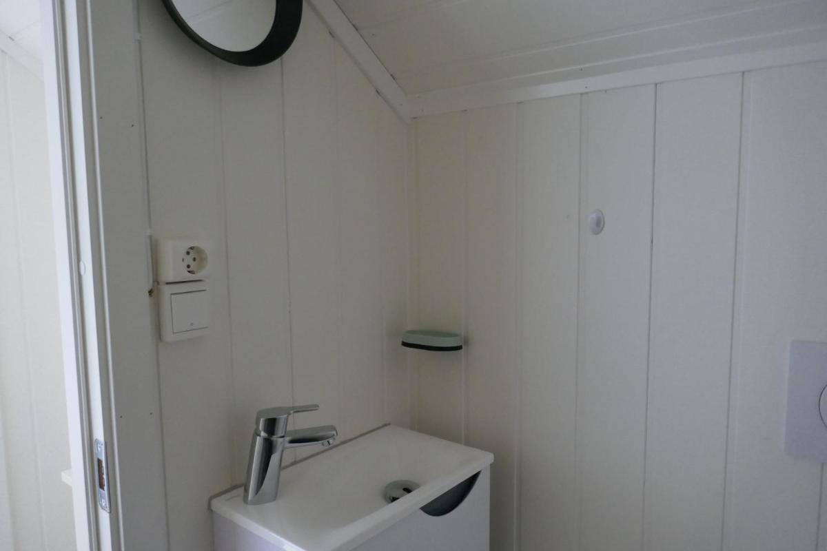 Three-Bedroom House - Photo 7