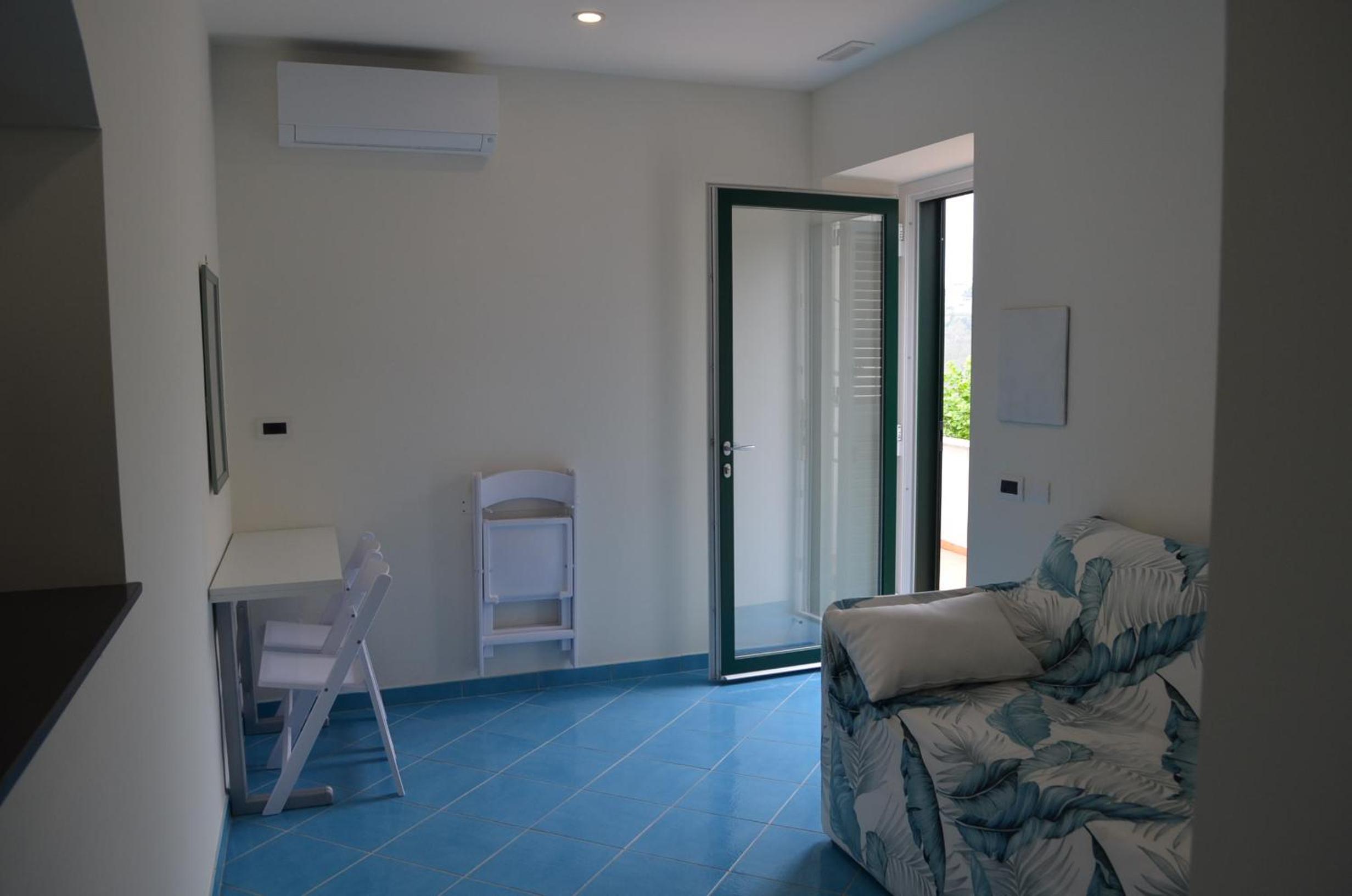 Deluxe Quadruple Room - Photo 2