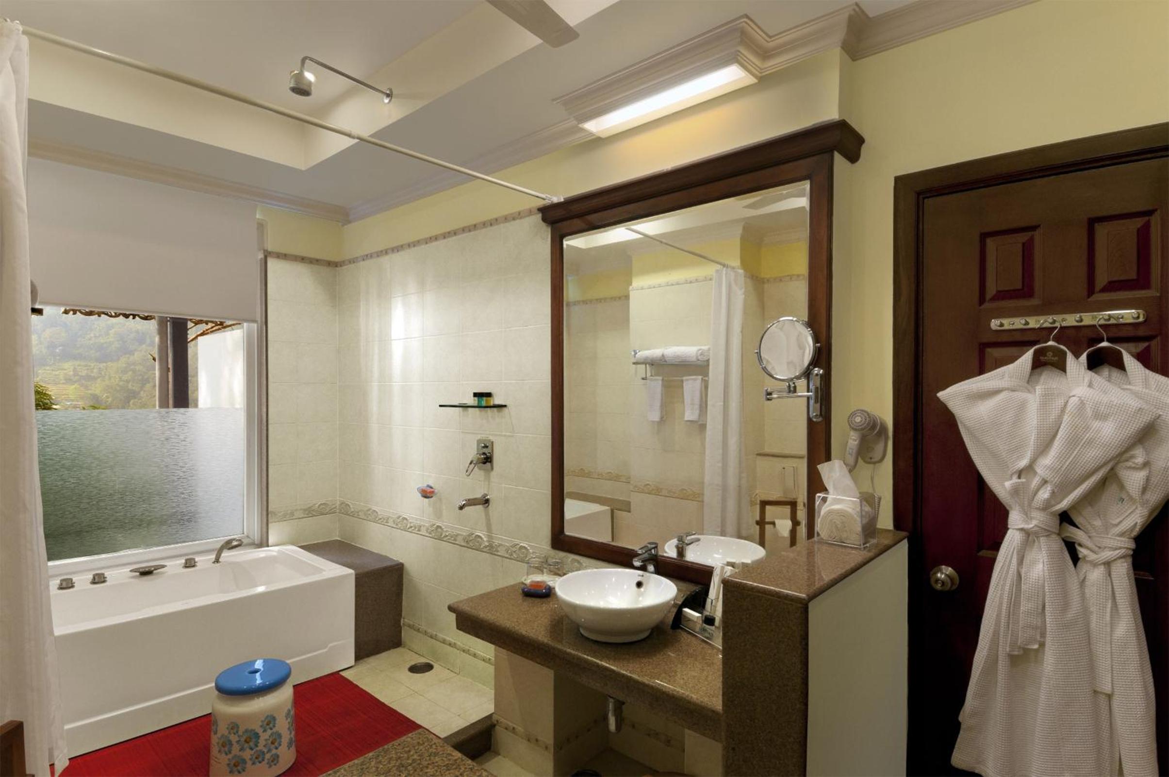 Deluxe Room - 10% Discount on Foods & Soft Beverages* | 15% Discounts on Laundry Services* | INR 500 spa credit during your stay on selective Massage services. TnC Apply.* | Free Minibar - 2 cans of soft Beverages (Once on Arrival) - Photo 7