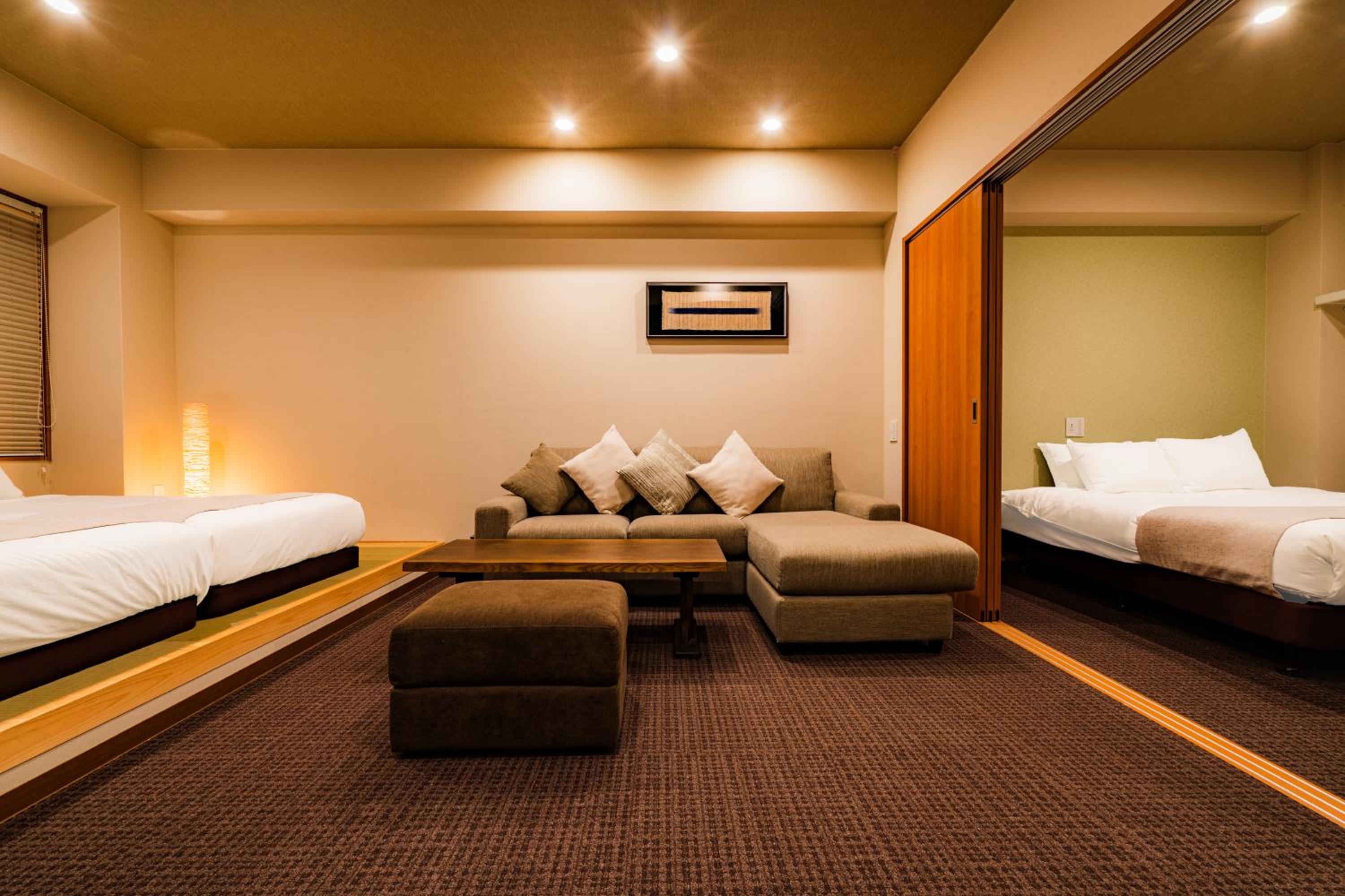 Deluxe Triple Room - Photo 7