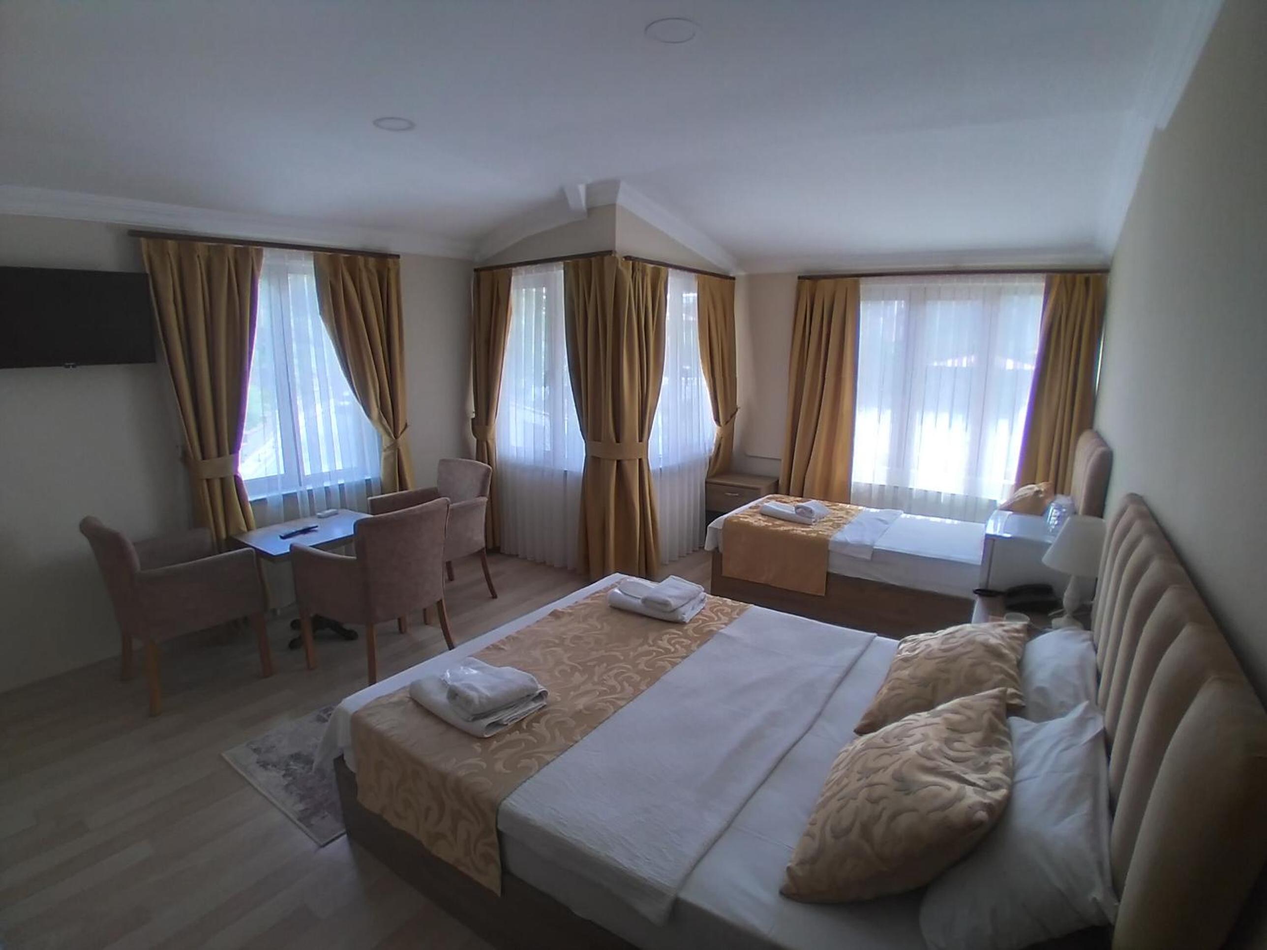 Luxury Triple Room photo 2