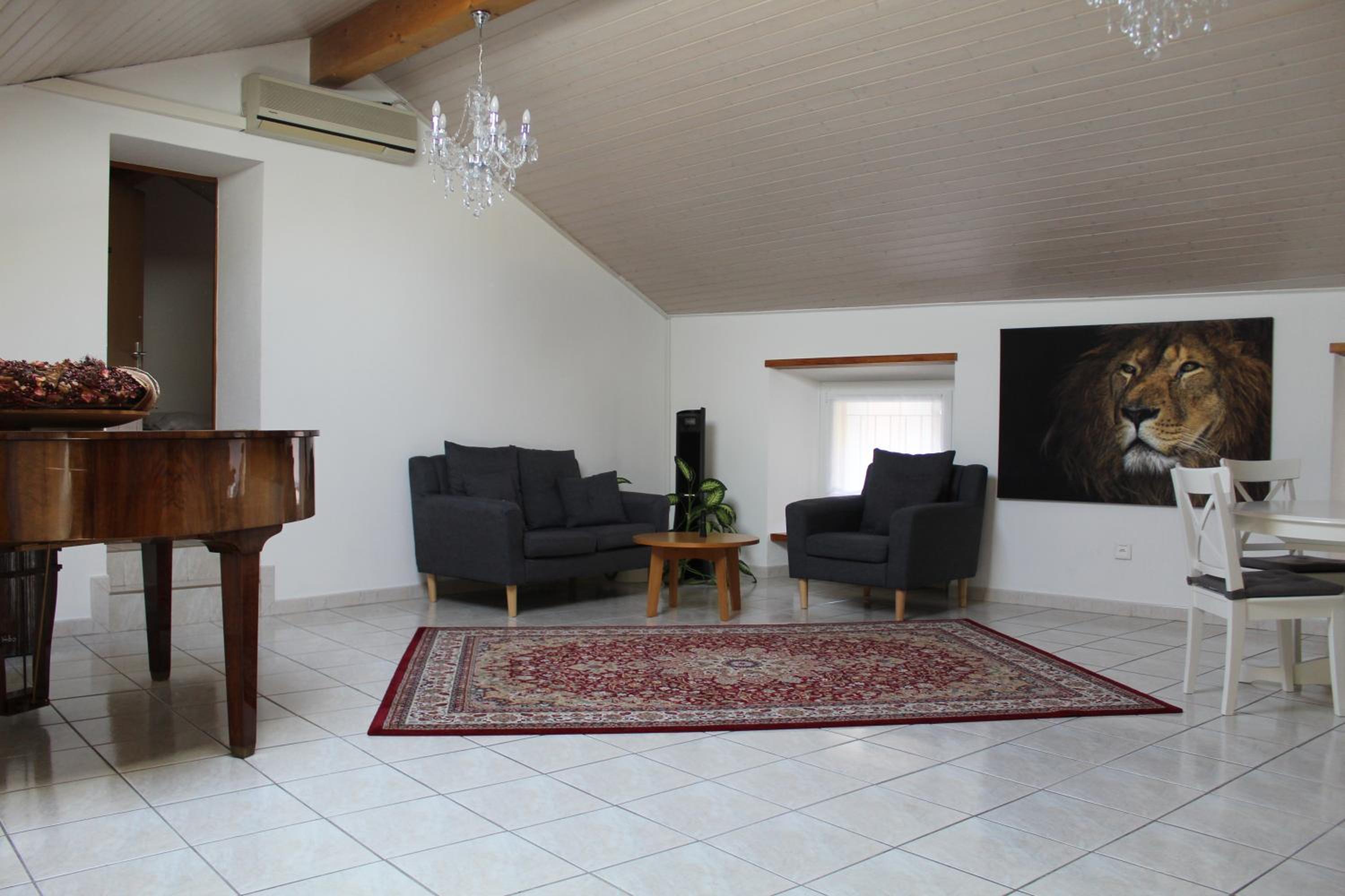 Three-Bedroom Apartment - Photo 12