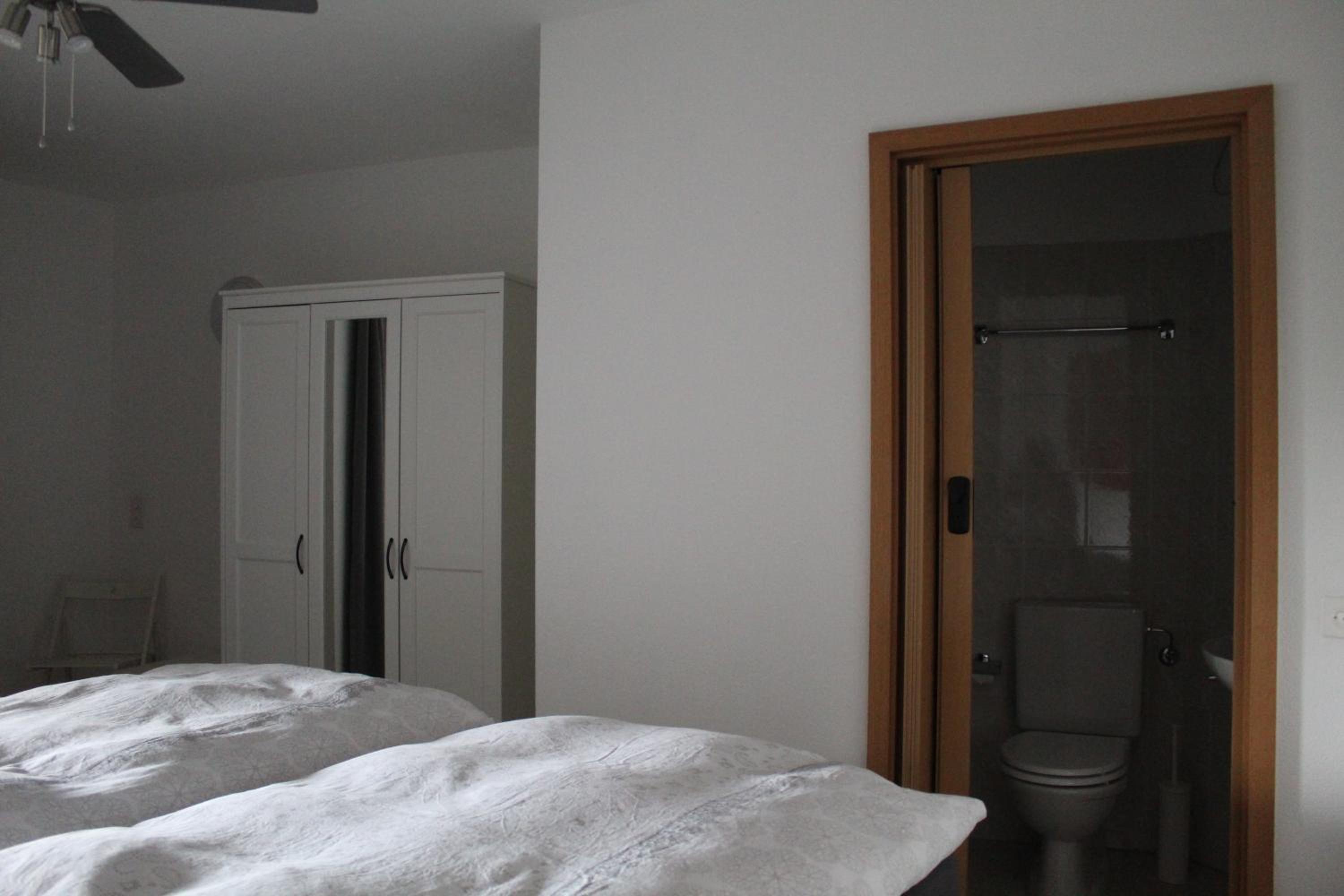 Three-Bedroom Apartment - Photo 18