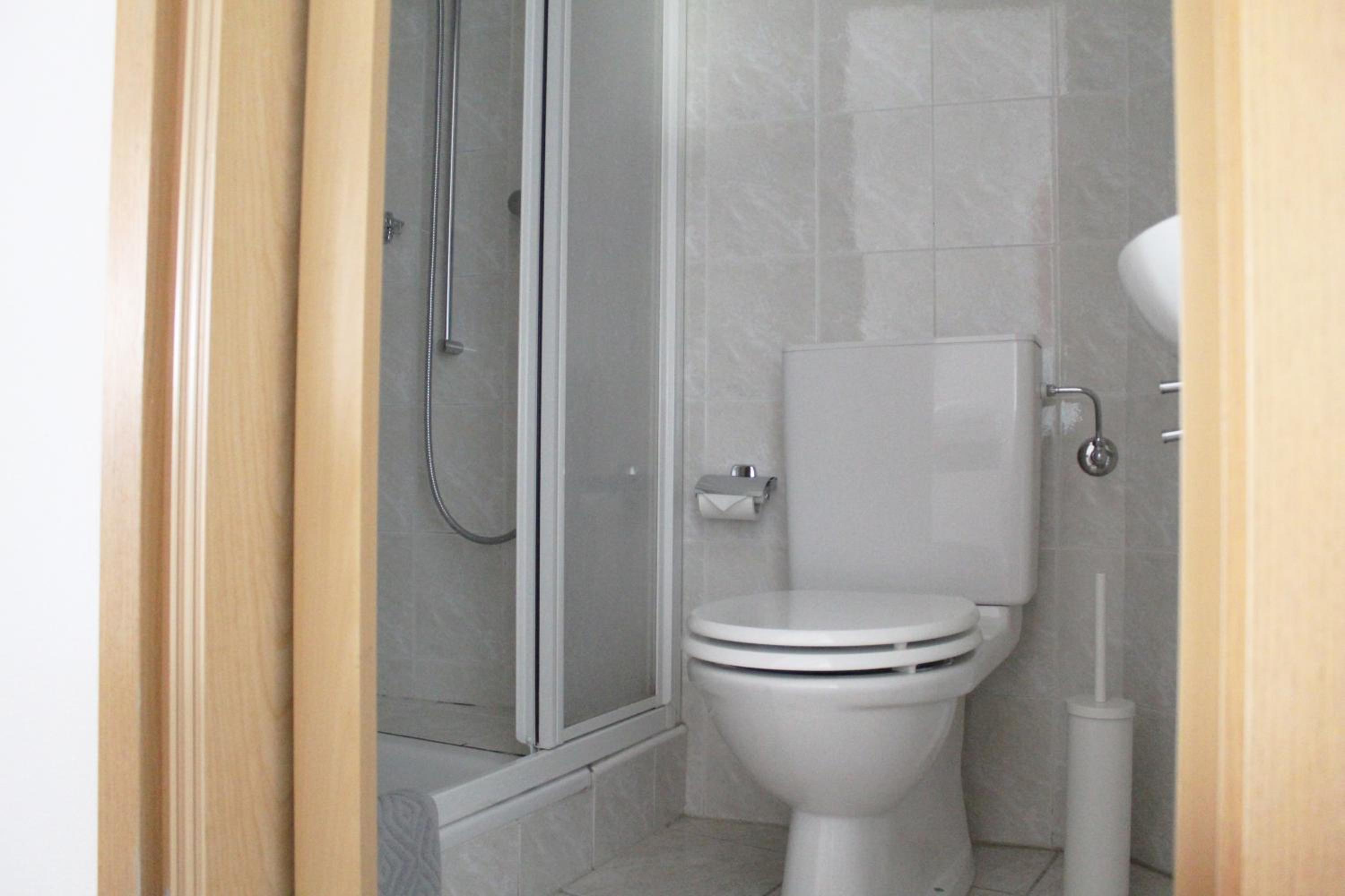Three-Bedroom Apartment - Photo 22