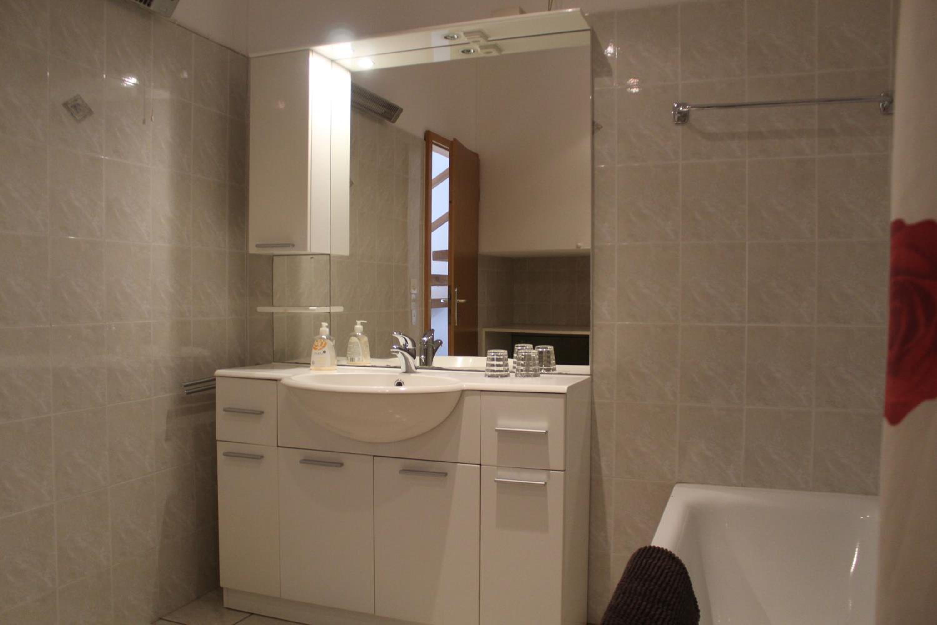 Three-Bedroom Apartment - Photo 32