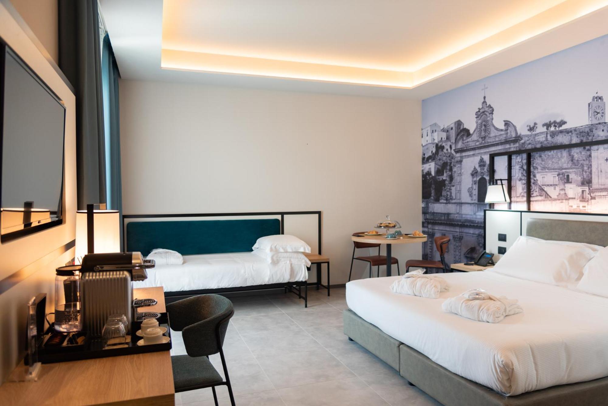 Deluxe Triple Room - Photo 1