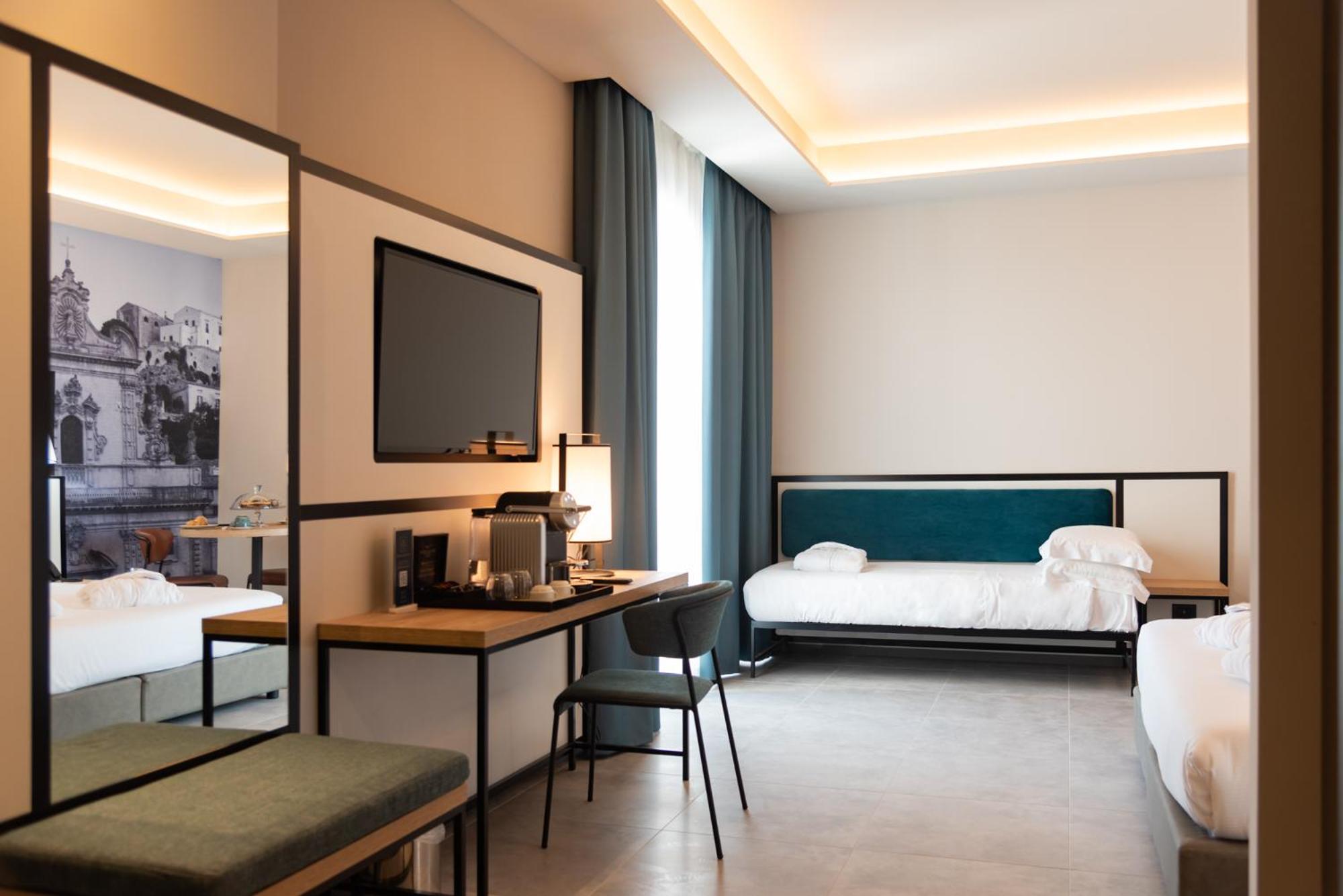 Deluxe Triple Room - Photo 17